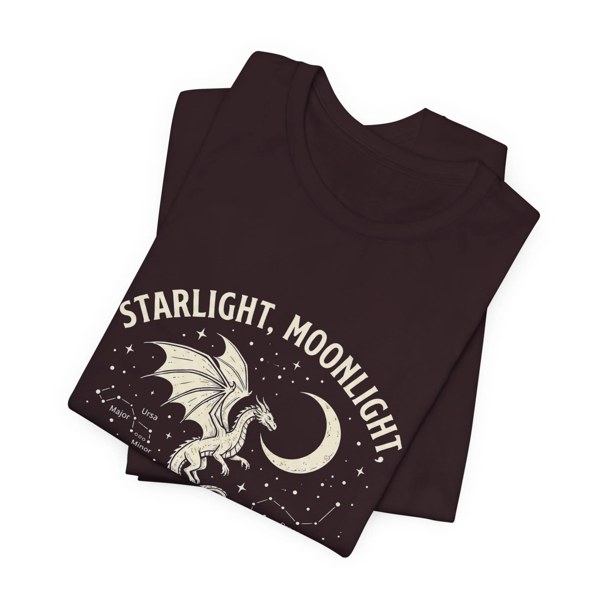 Folded Oxblood Black Bella+Canvas fantasy dragon graphic t-shirt.