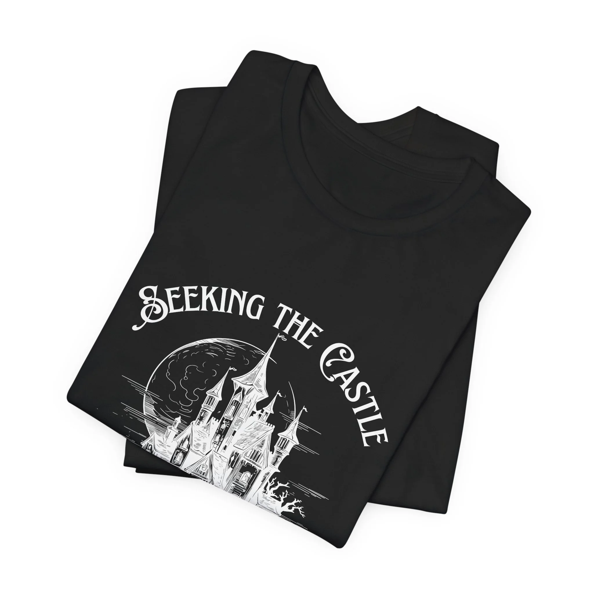 Folded Black Bella+Canvas fantasy castle graphic t-shirt.