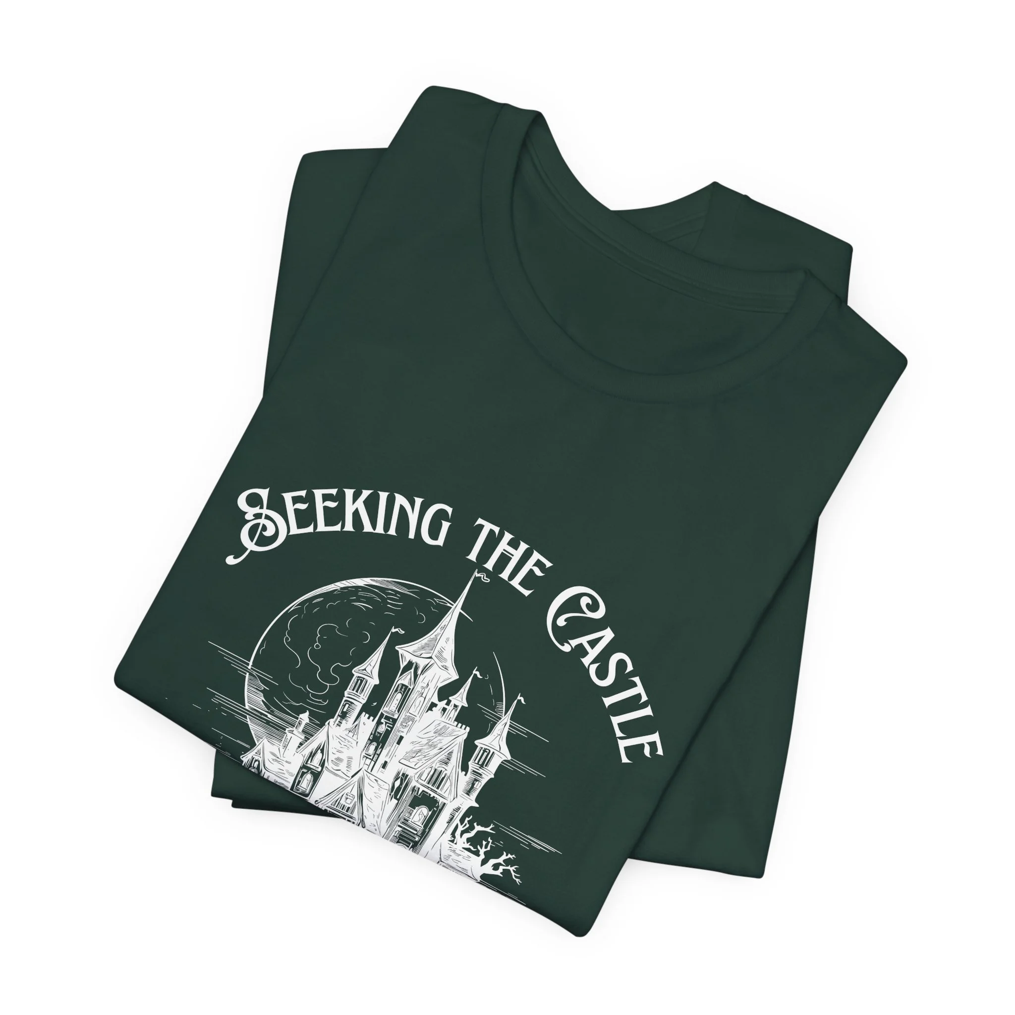 Folded Forest Green Bella+Canvas fantasy castle graphic t-shirt.