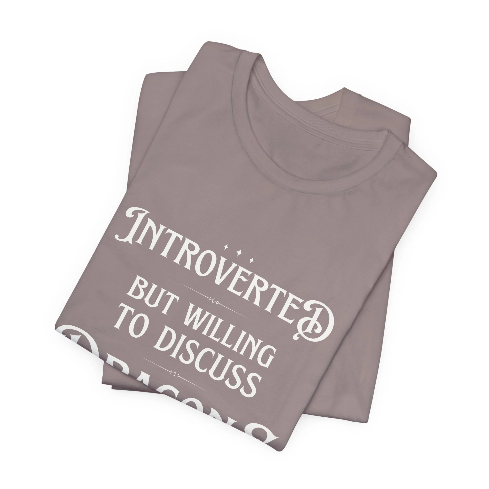 Folded Pebble Brown Bella Canvas t-shirt featuring the "Introverted but Willing to Discuss Dragons" design.
