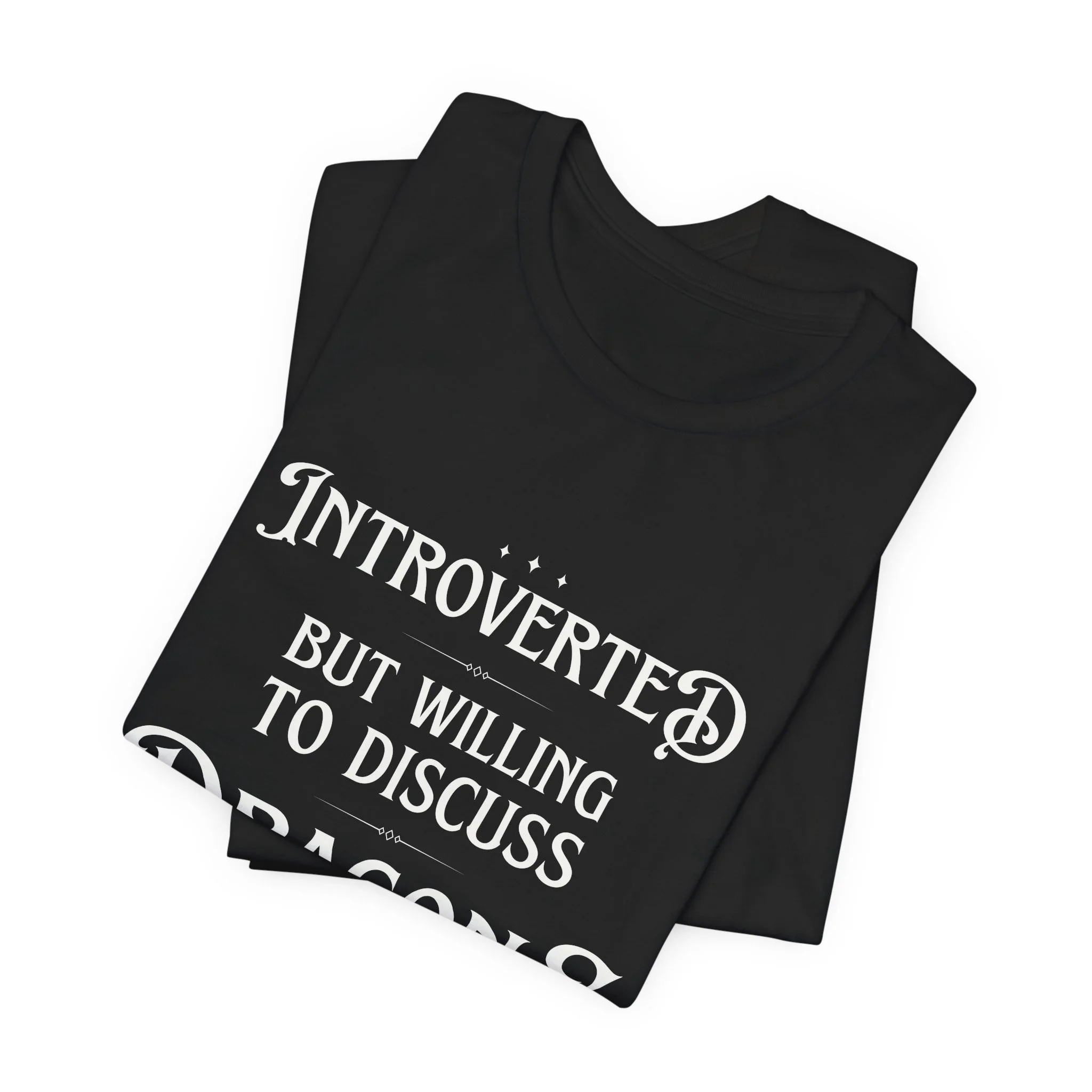 Folded Black Bella Canvas fantasy typography graphic t-shirt.