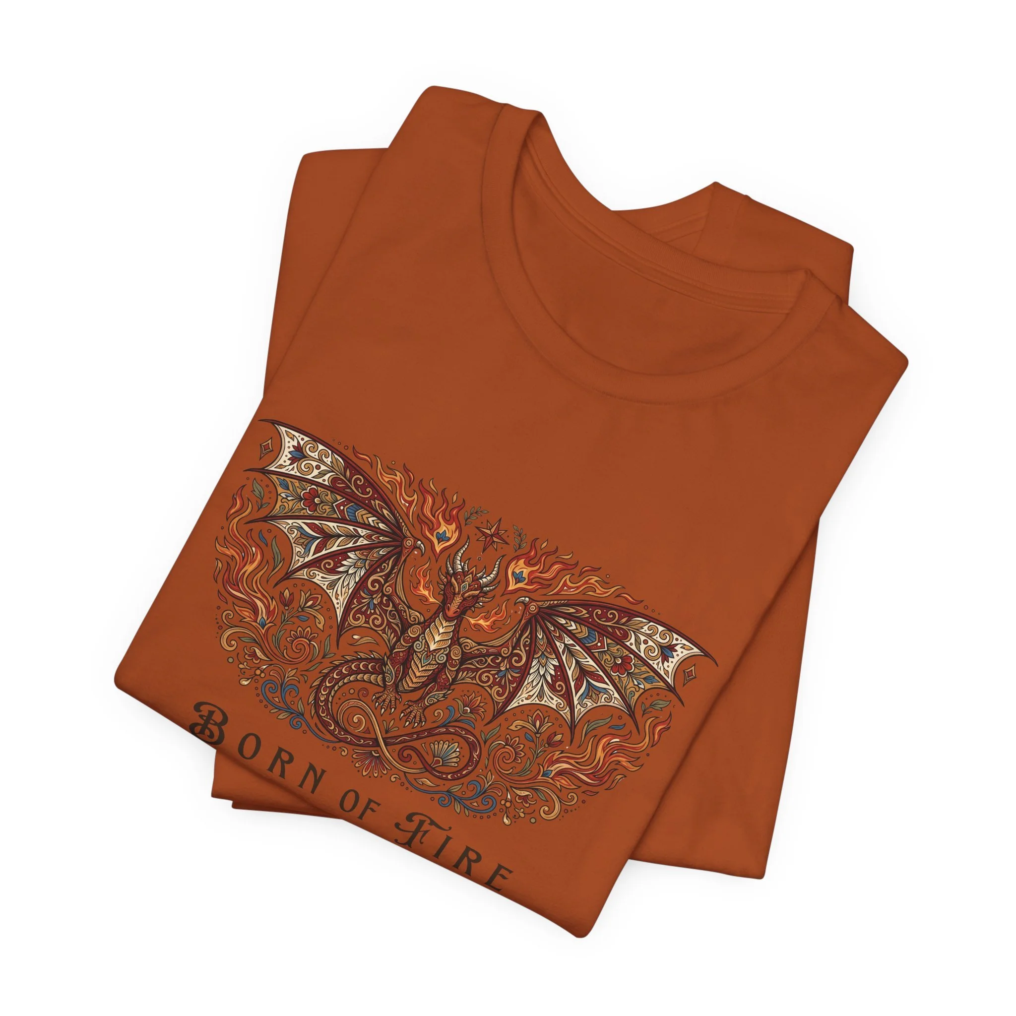 Folded autumn orange dragon lover shirt with intricate wings and swirling fall-inspired details.