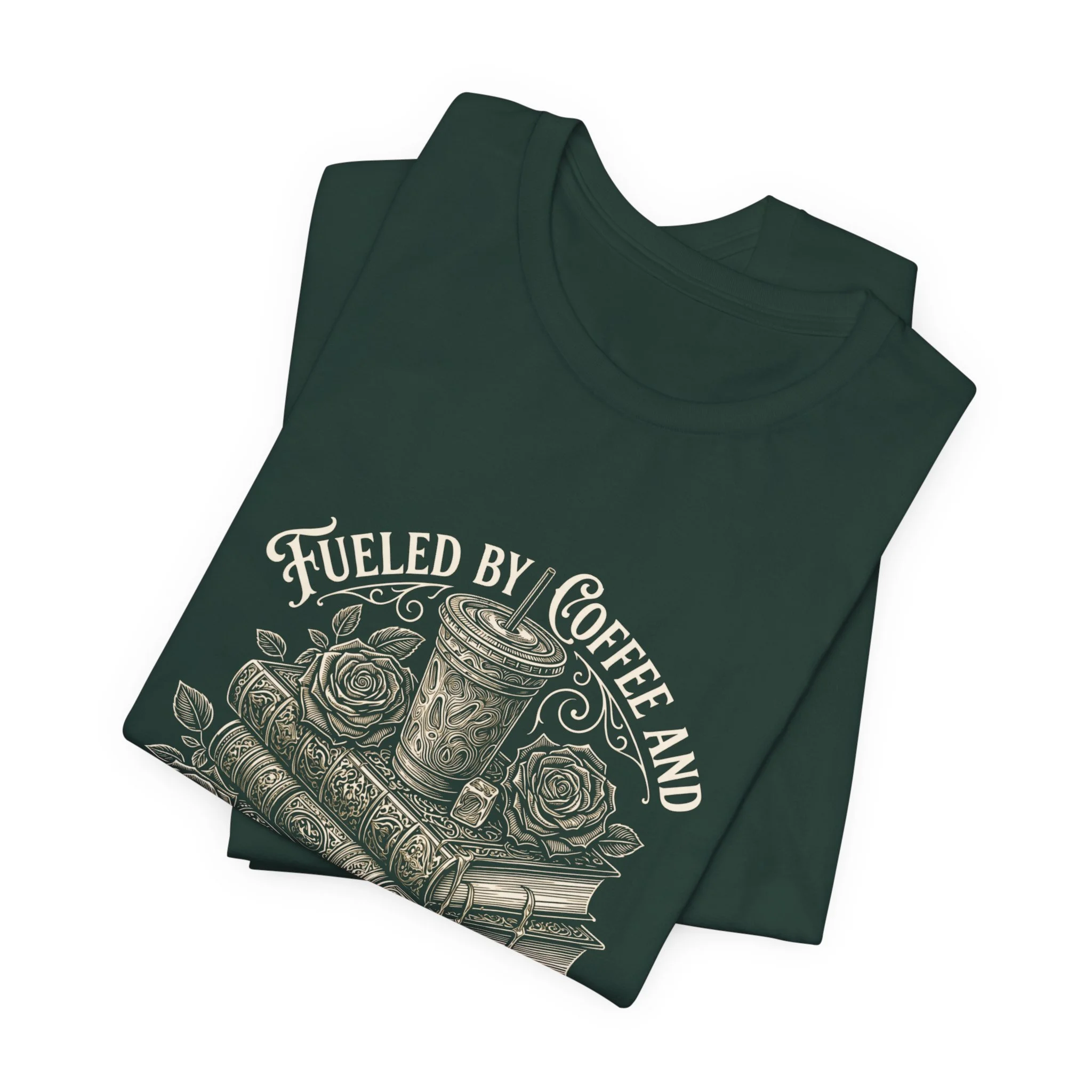 Folded Forest Green Bella+Canvas t-shirt featuring the "Fueled by Coffee and Smutty Tales" design.