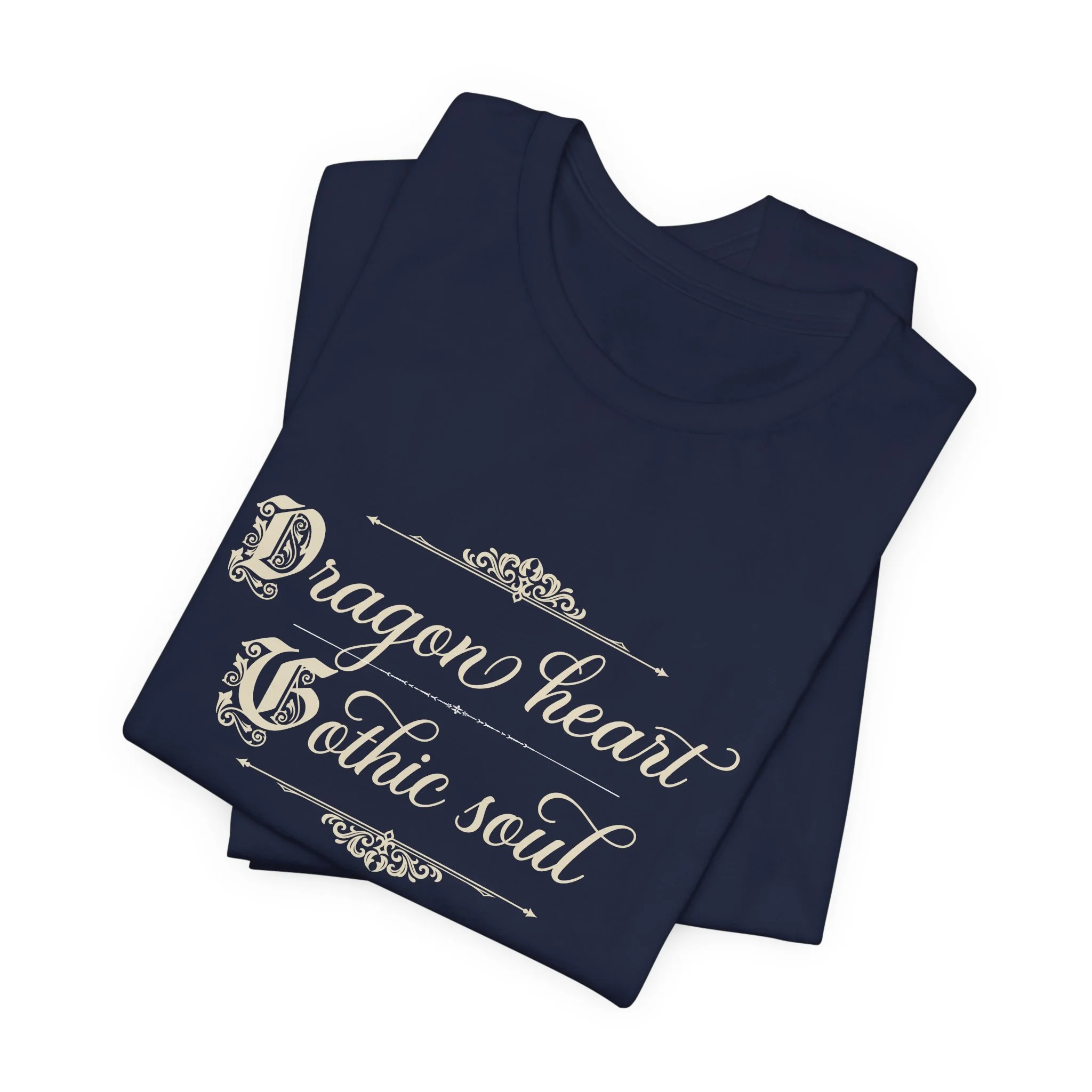 Folded Navy Bella+Canvas t-shirt featuring the "Dragon Heart, Gothic Soul" graphic with decorative accents.
