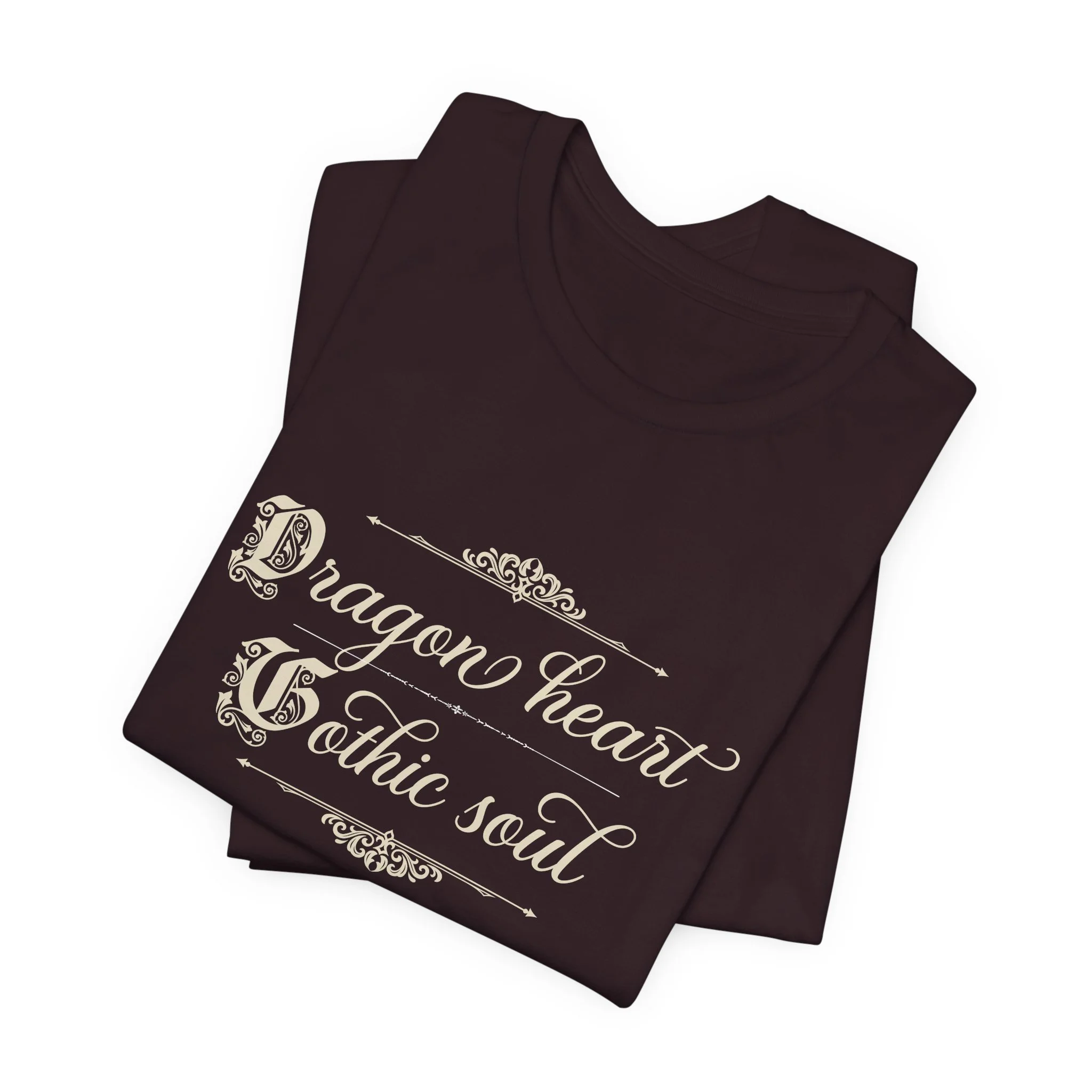 Folded Oxblood Black Bella+Canvas gothic fantasy graphic t-shirt with ornate flourishes.