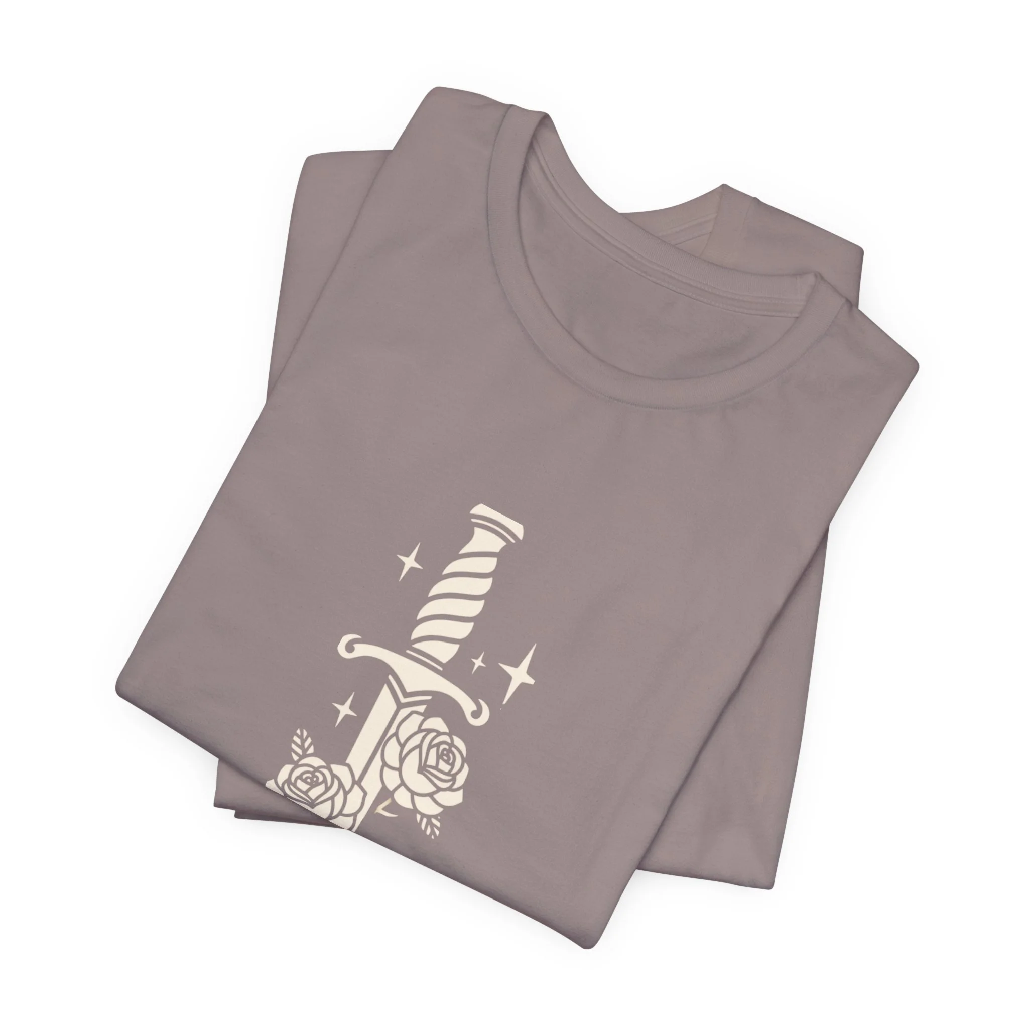 Folded Pebble Brown Bella+Canvas t-shirt featuring a vintage dagger and roses fantasy graphic.
