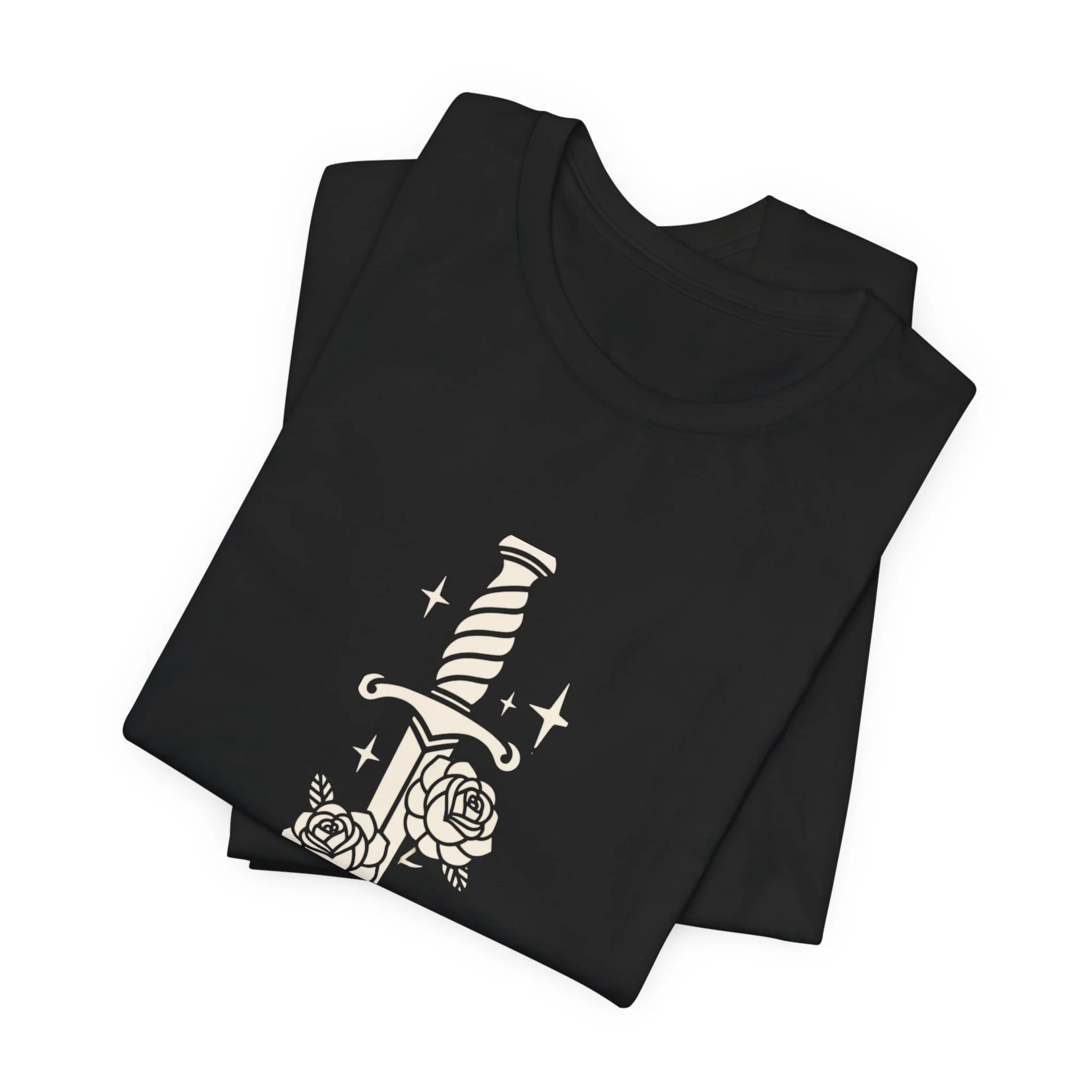 Folded Black Bella+Canvas fantasy t-shirt with ornate dagger and floral illustration.