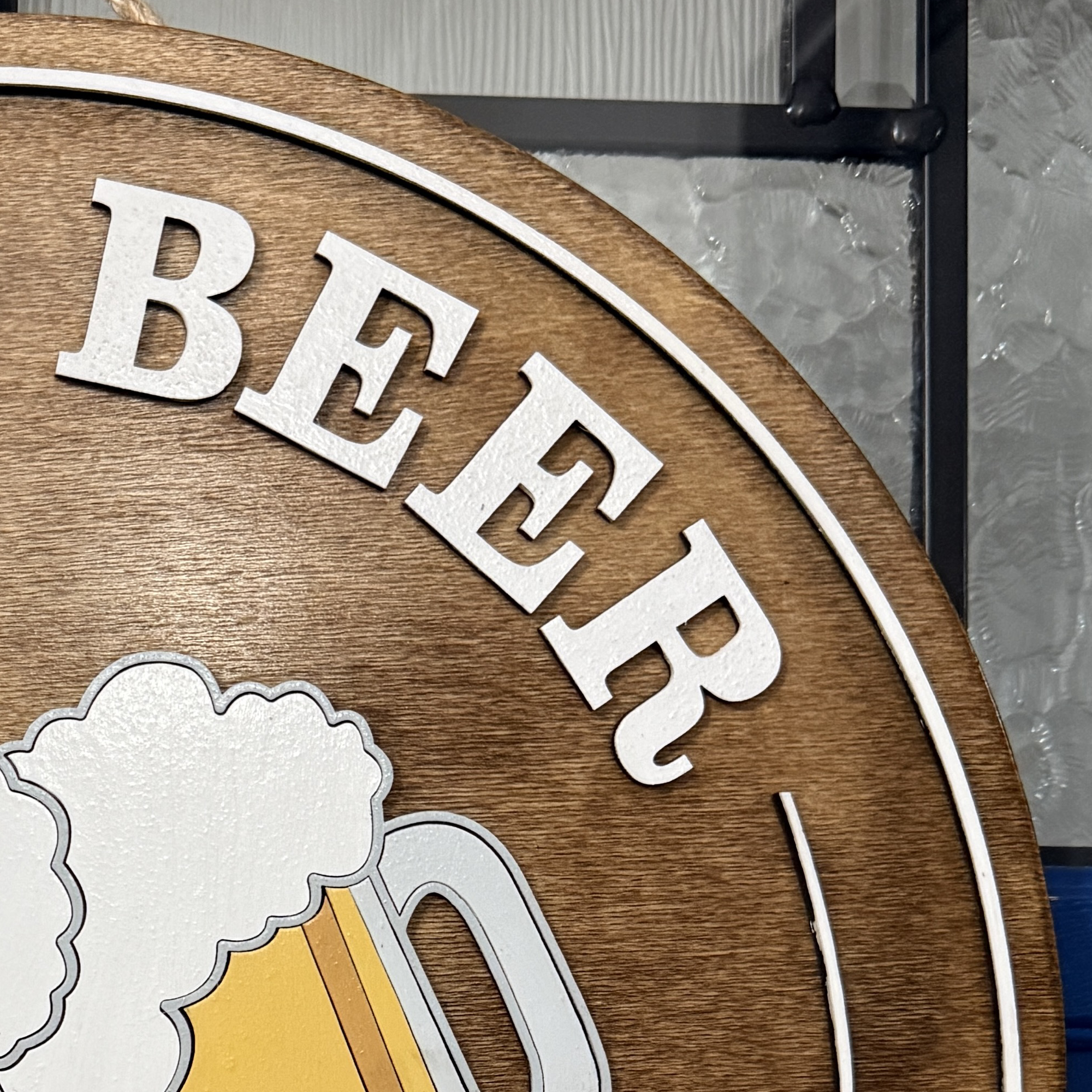 Close-up of lower text “and maybe 3 people” with decorative greenery detail