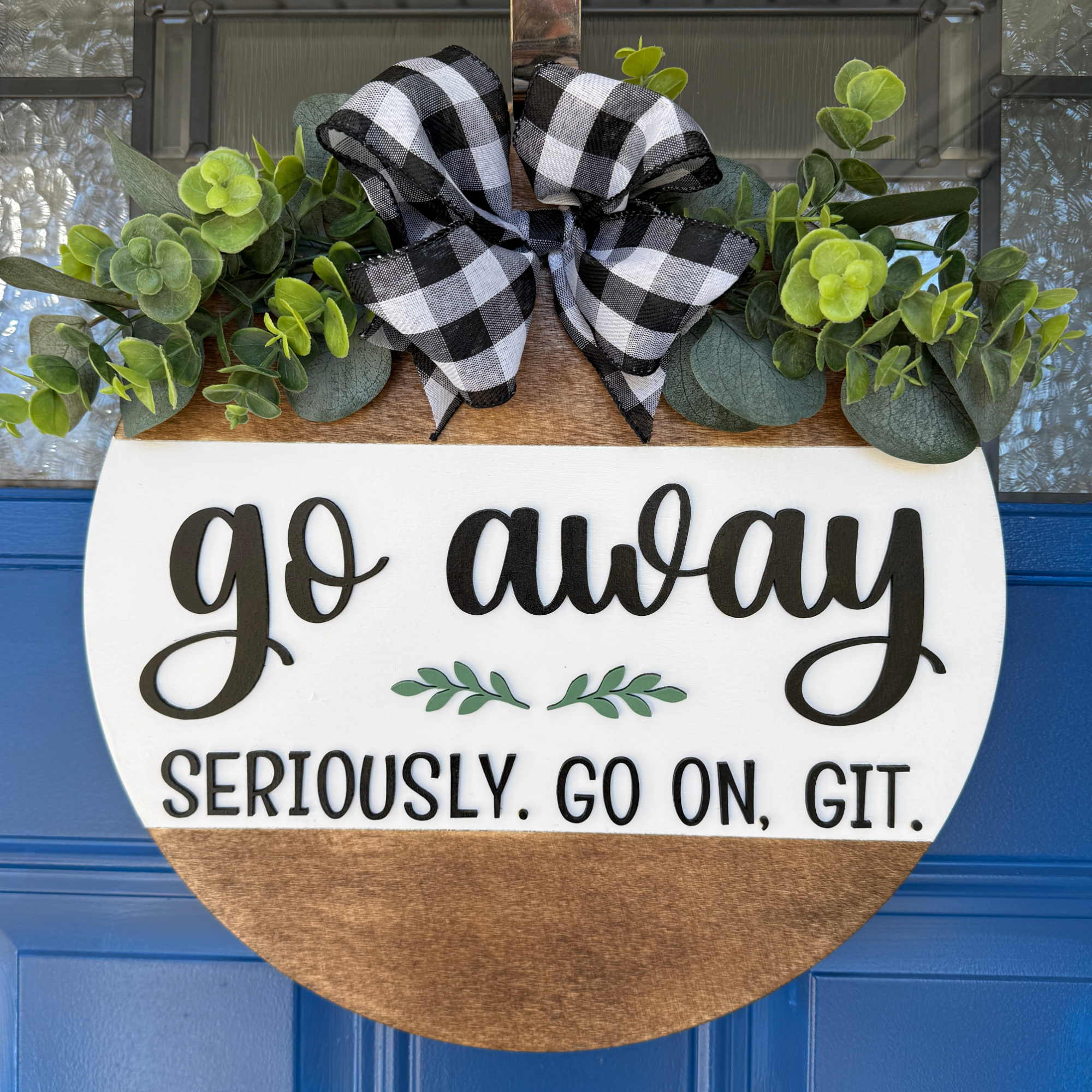 Go Away Door Hanger – 14" Wood Round with Buffalo Check Bow, Greenery, and Funny Farmhouse Style Quote for Front Door Decor