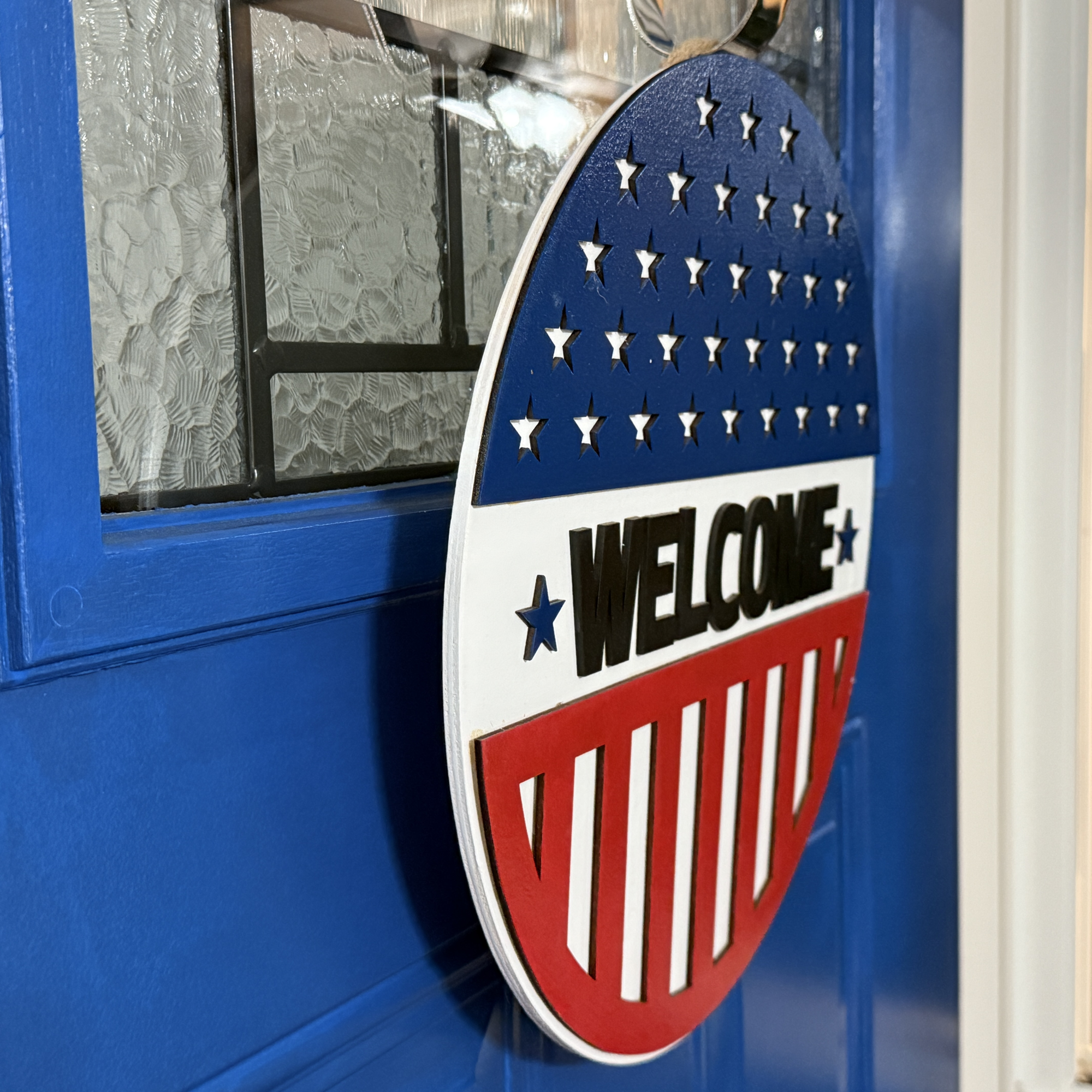 Stars & Stripes door hanger, side view, showing base thickness and layered wood details