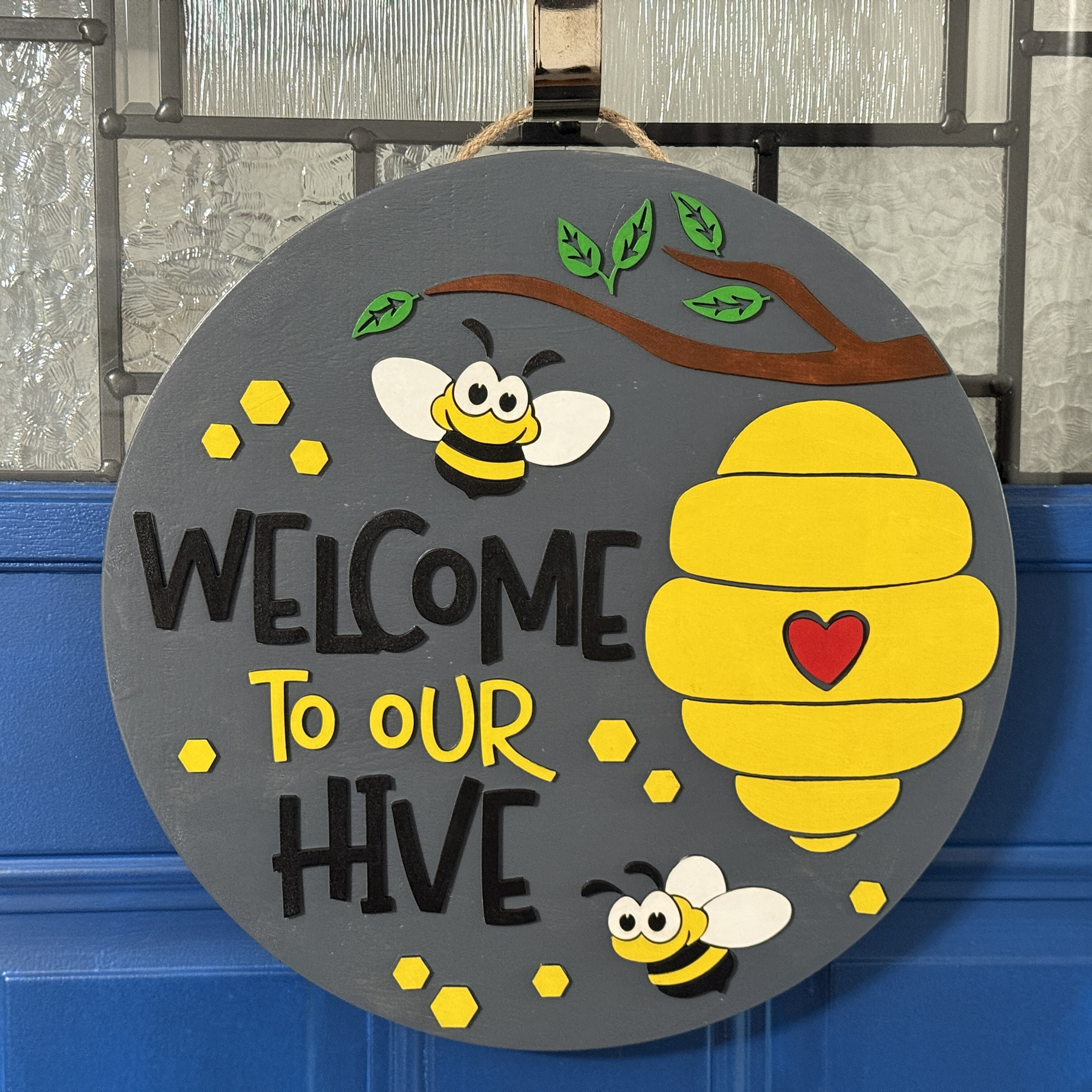 Welcome to our Hive door hanger on gray base