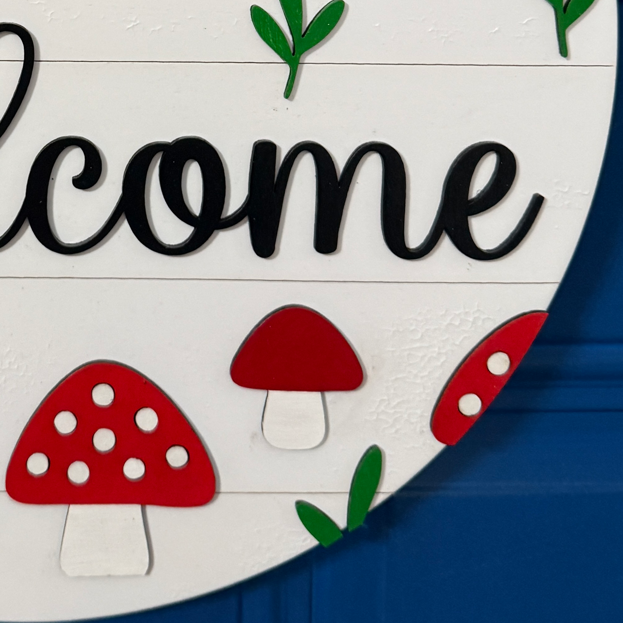 Whimsical summer welcome sign with mushrooms and layered wood lettering