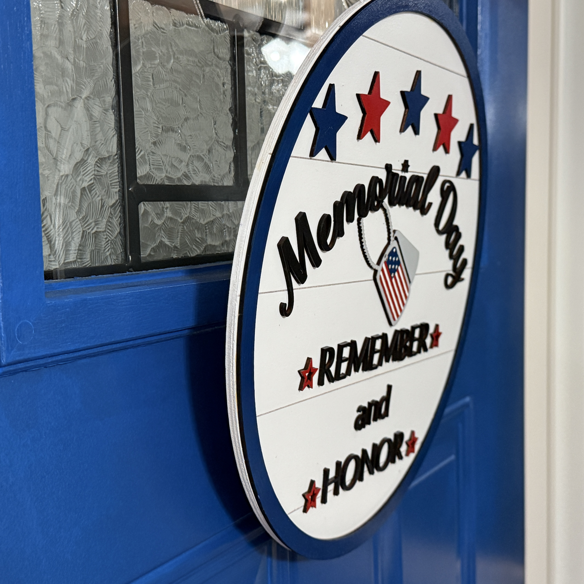 Memorial Day door hanger, side view, showing base thickness and layered wood details