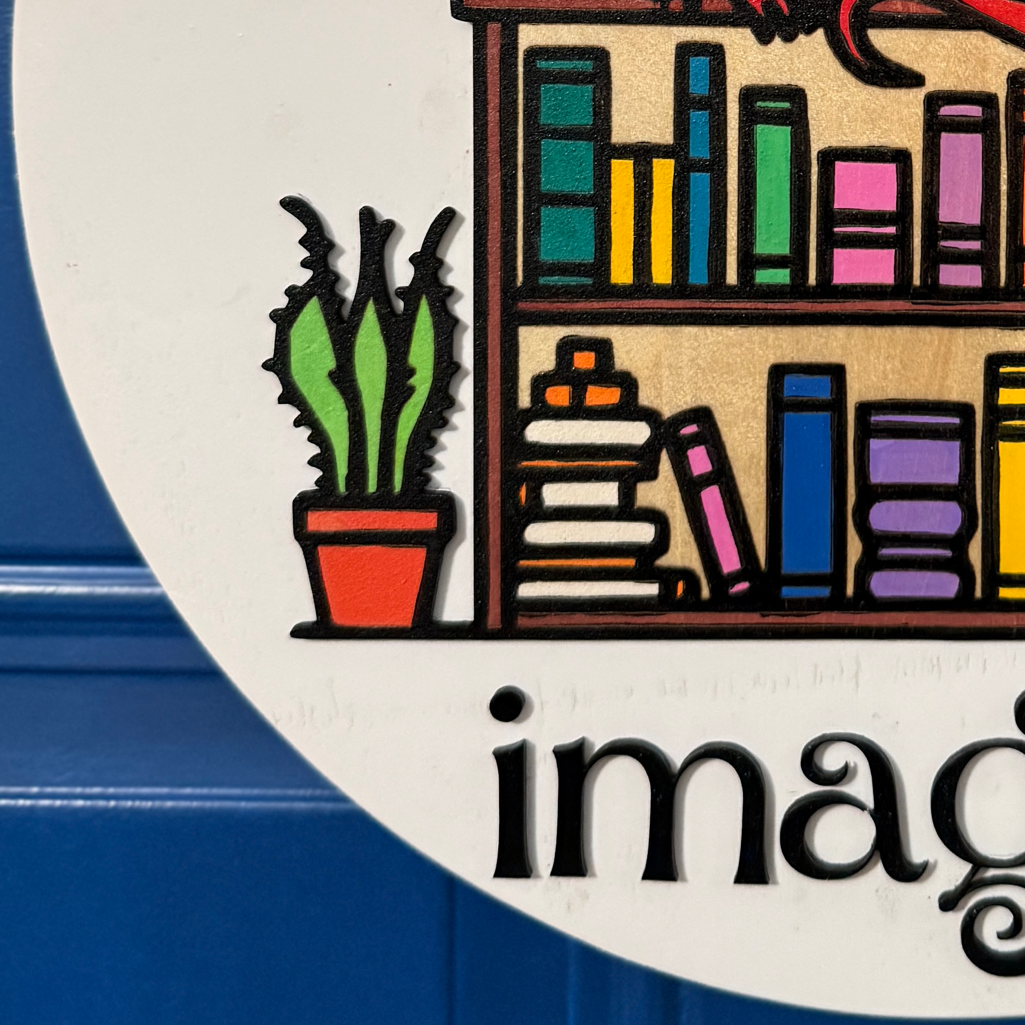 Close-up of colorful stacked books on wooden shelf with vibrant hand-painted details