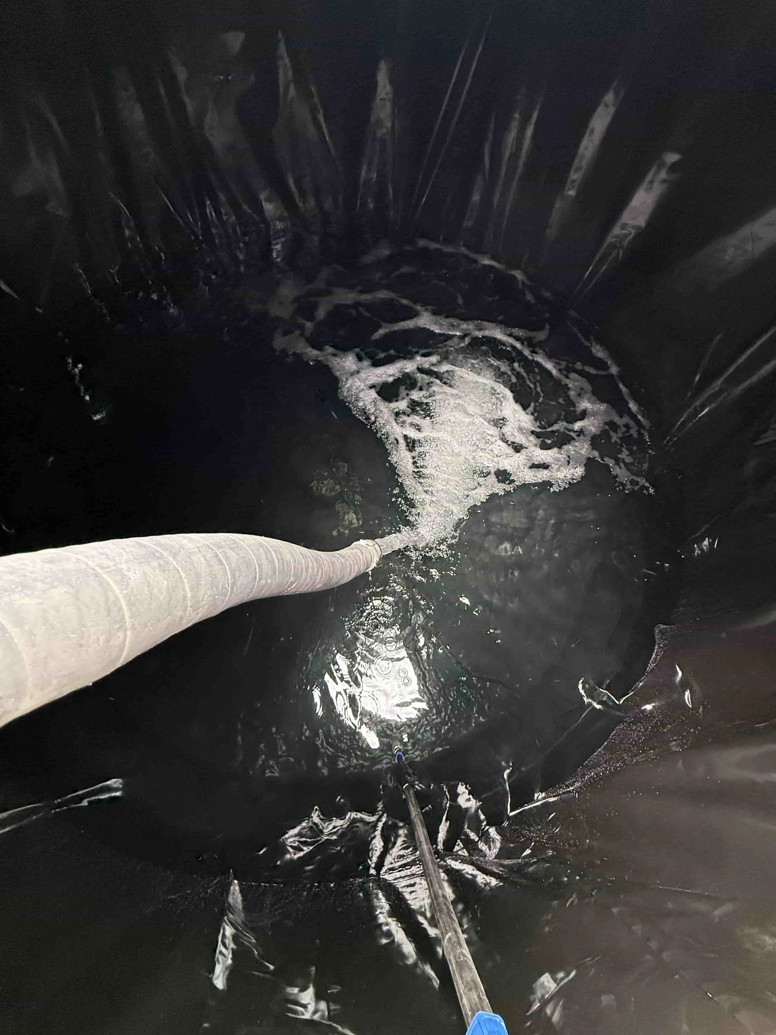 Pumping clean water back into a tank after installing a Tankliner.