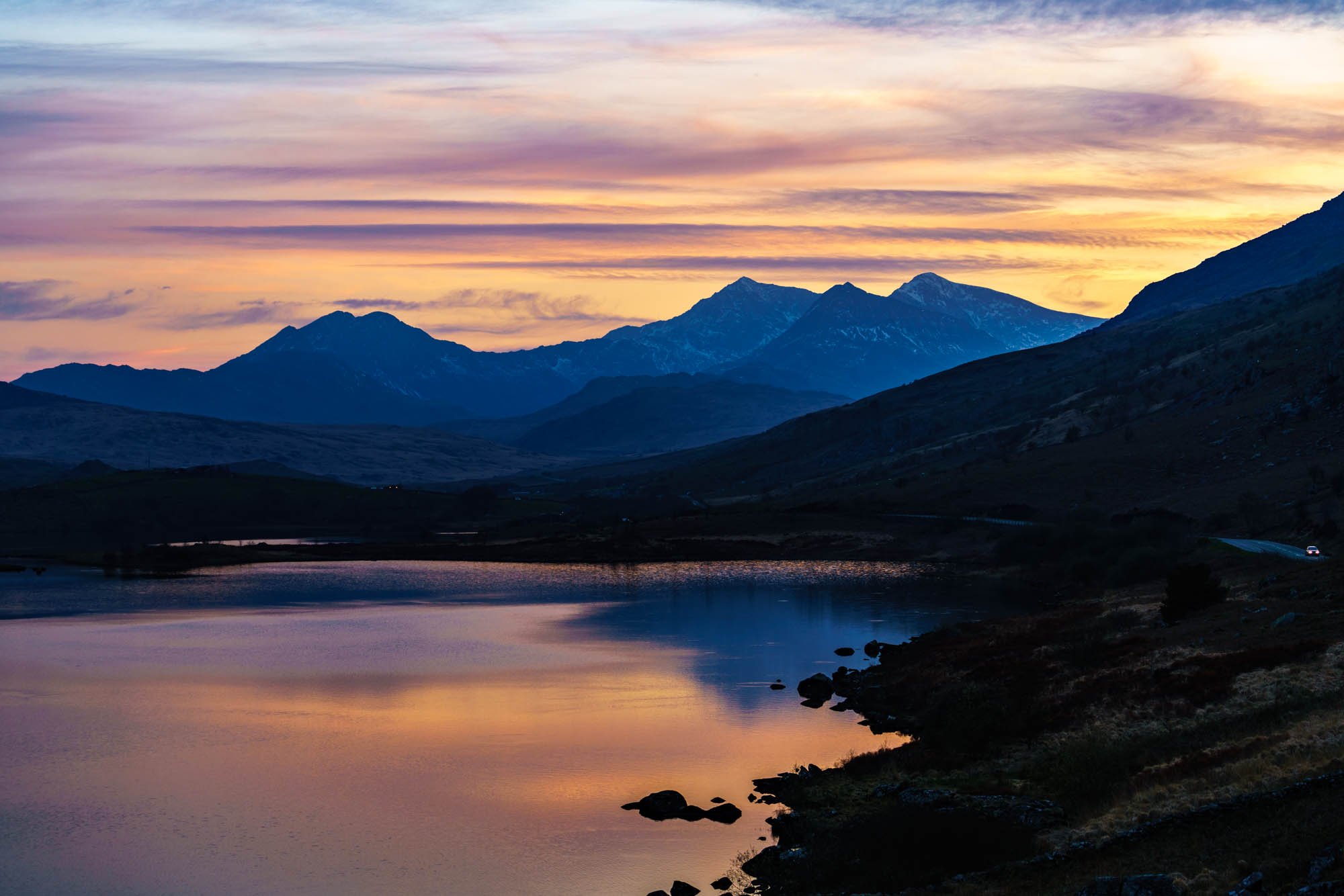 The Snowdon horseshoe with dramatic winter sunset light above