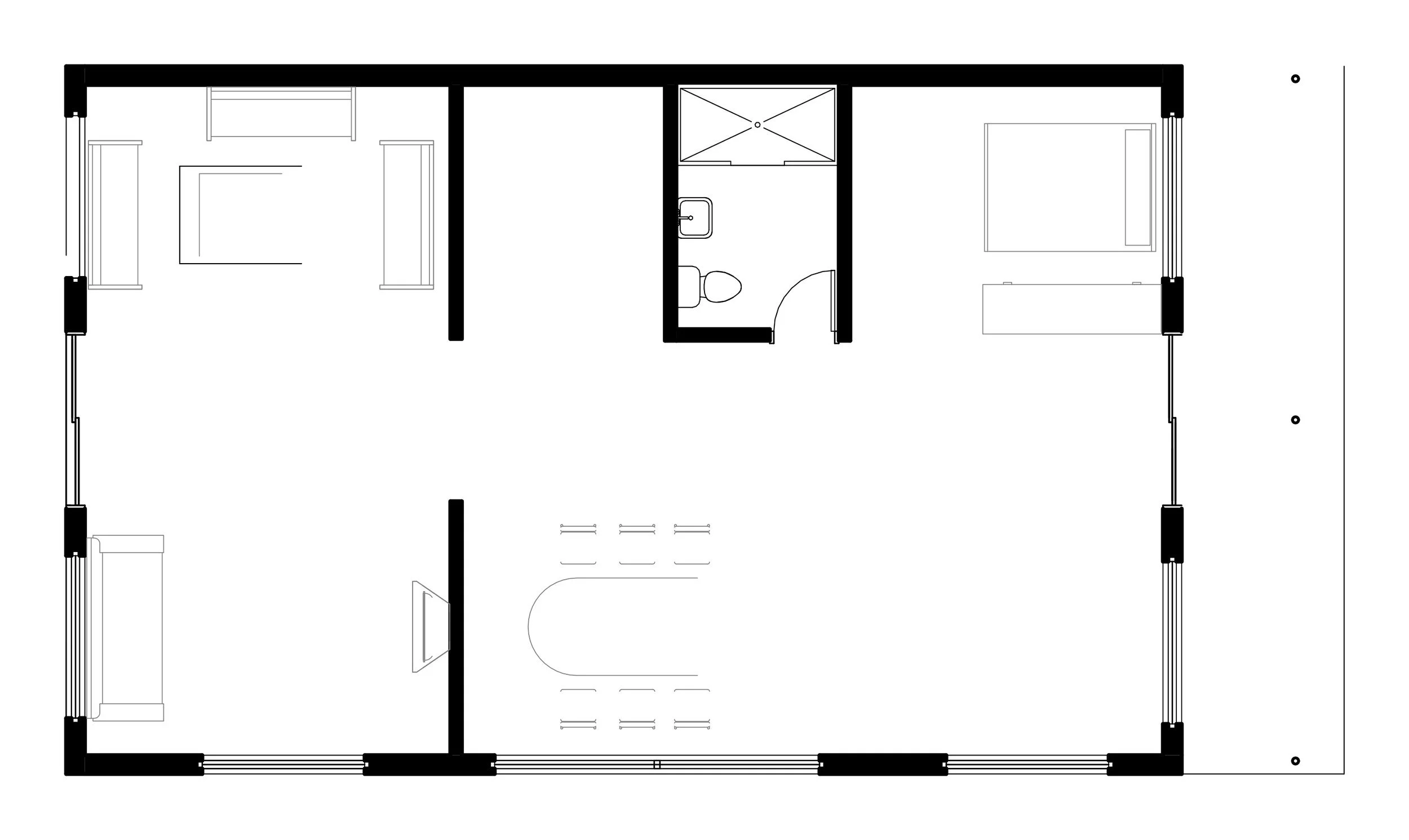 Floor plan of the single storey house with solid black walls, sliding doors to the entry and verandah, and furniture shown in light line.