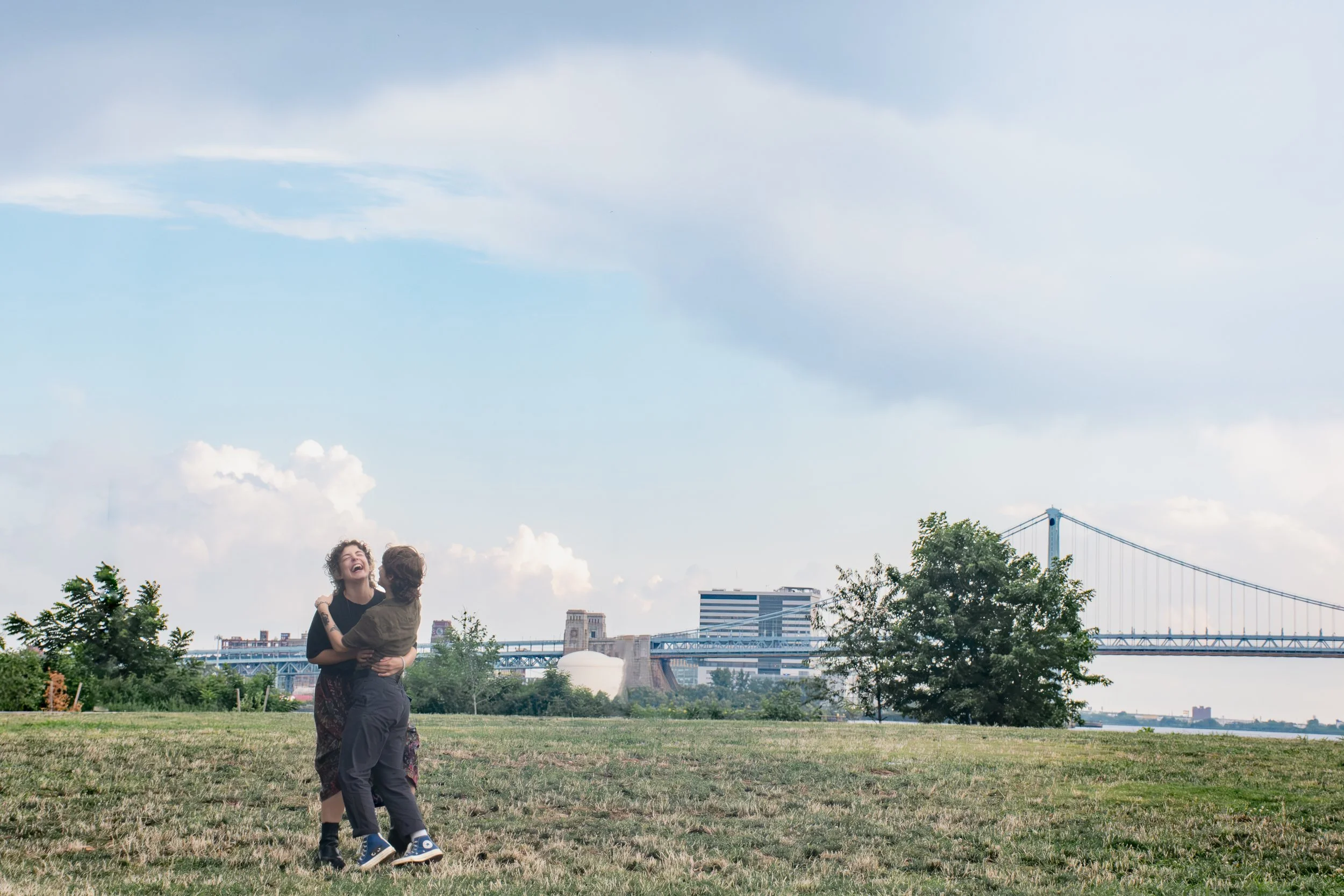 Just two souls in love, laughing under the Philadelphia sky - Documenting joy exactly as it unfolds. Raw, Candid, and true.