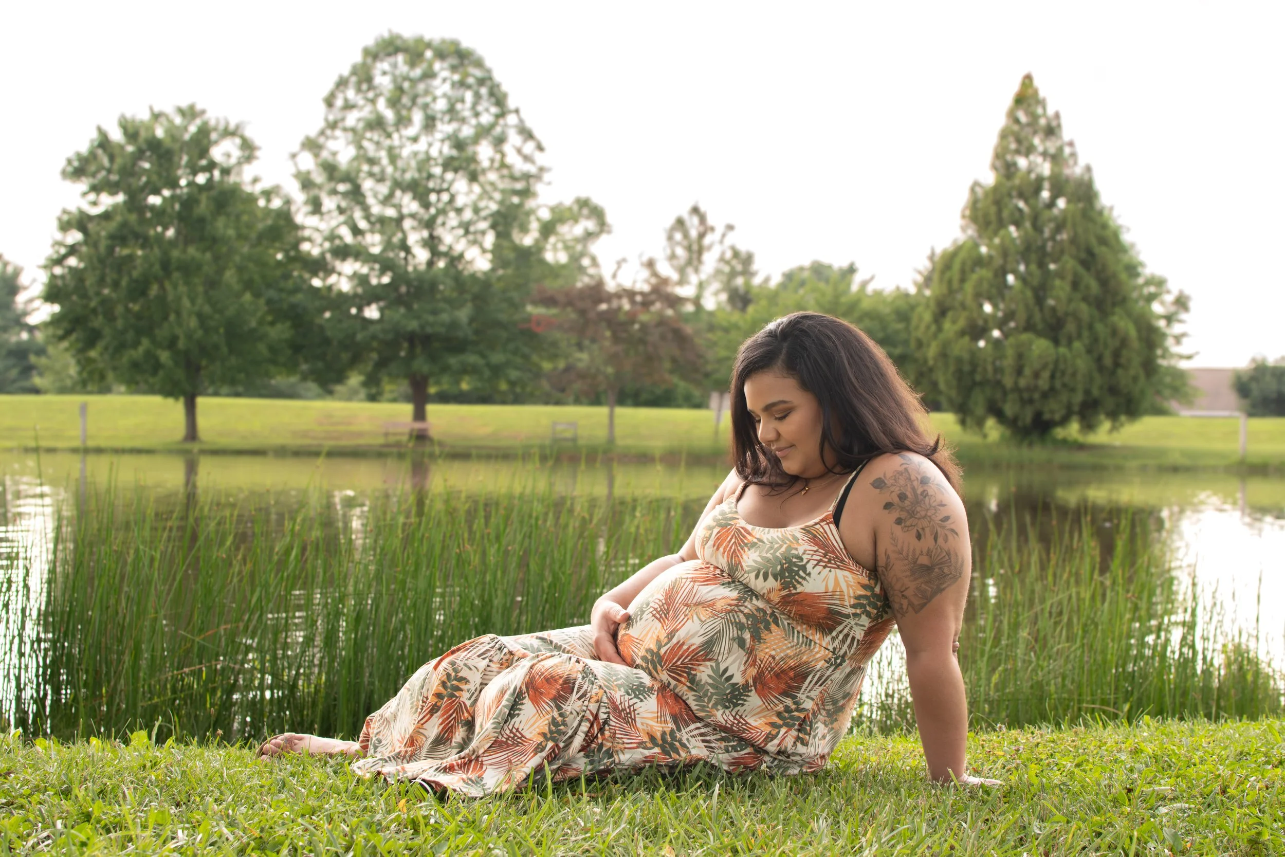 Quiet moments by the water, waiting for the sweetest new chapter to arrive. Maternity photos that show how much you're glowing