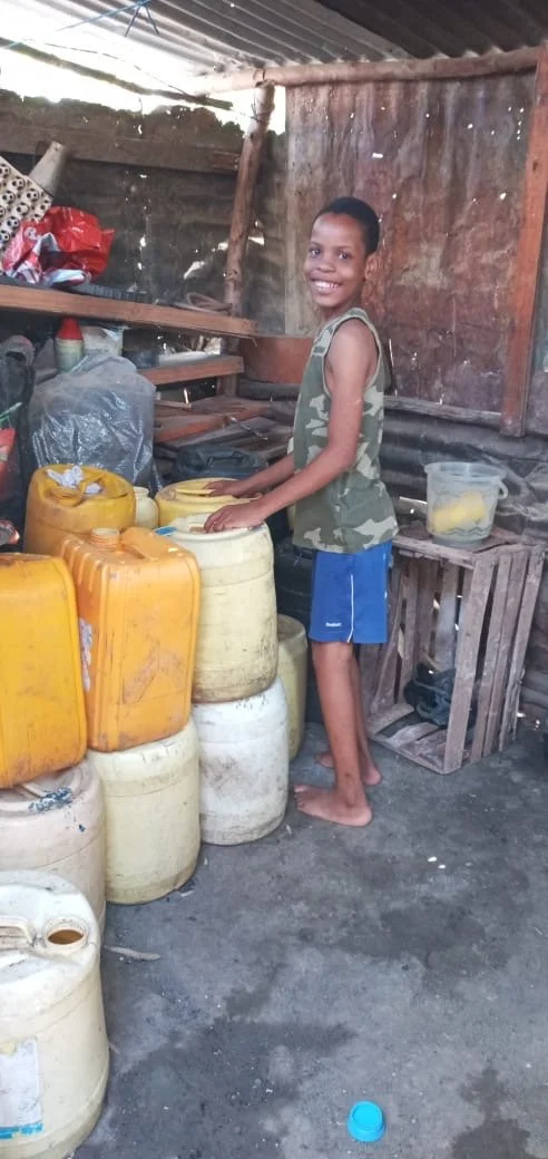 Gibran stocking water.