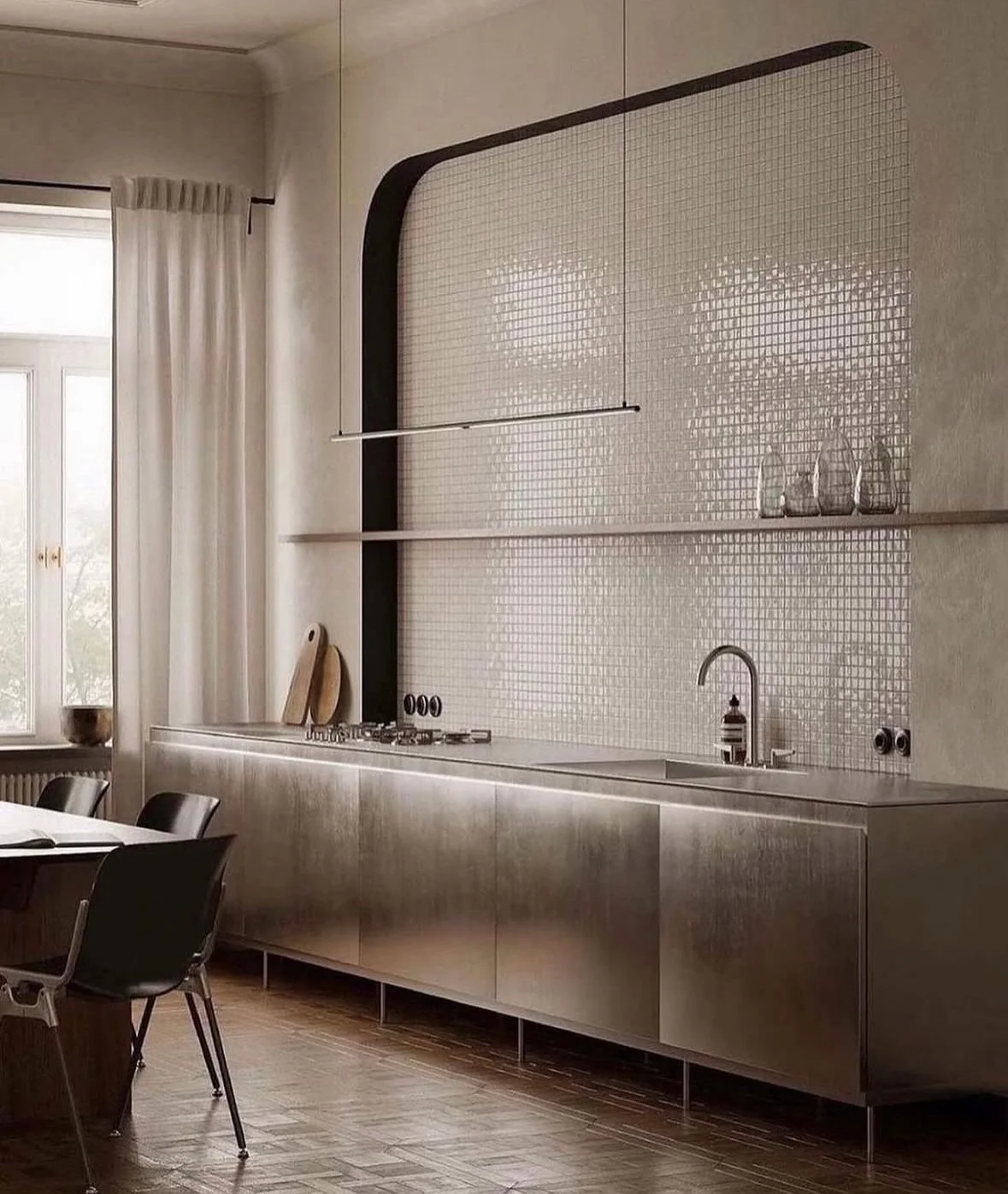 With everyone leaning toward stone surfaces, @juliabimer took an unexpected, industrial approach in this Warsaw kitchen. Without a stone in sight, the design relies on the strength of metal, glass, and wood to create warmth through contrast.