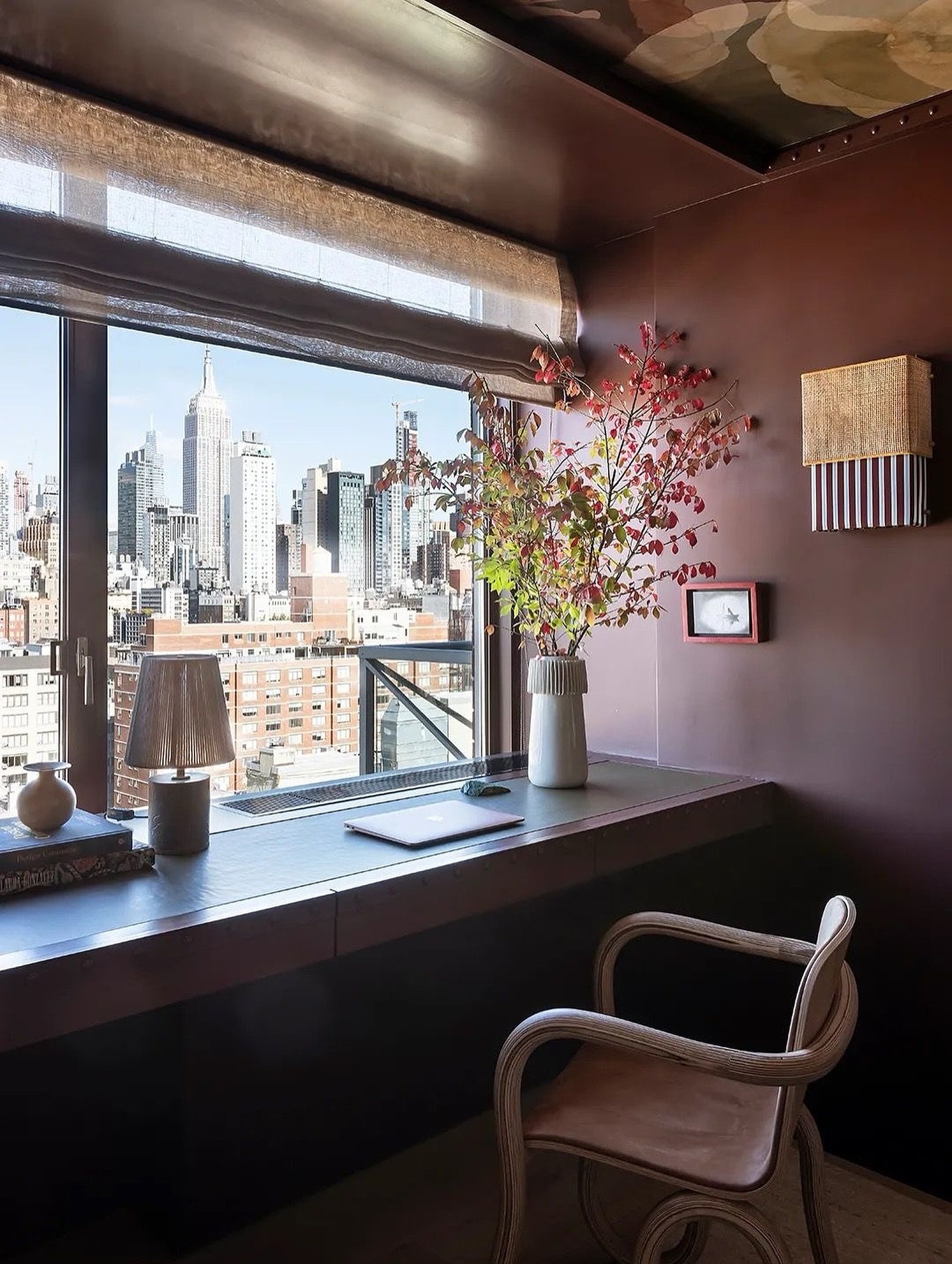 A work-from-home corner with one of the best backdrops in the city. Good design makes even the busiest days feel balanced.