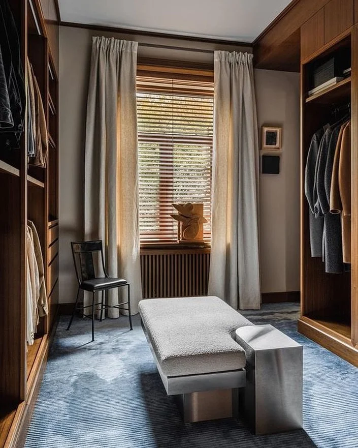 Masculine dressing room with a serene, tailored approach to daily living.