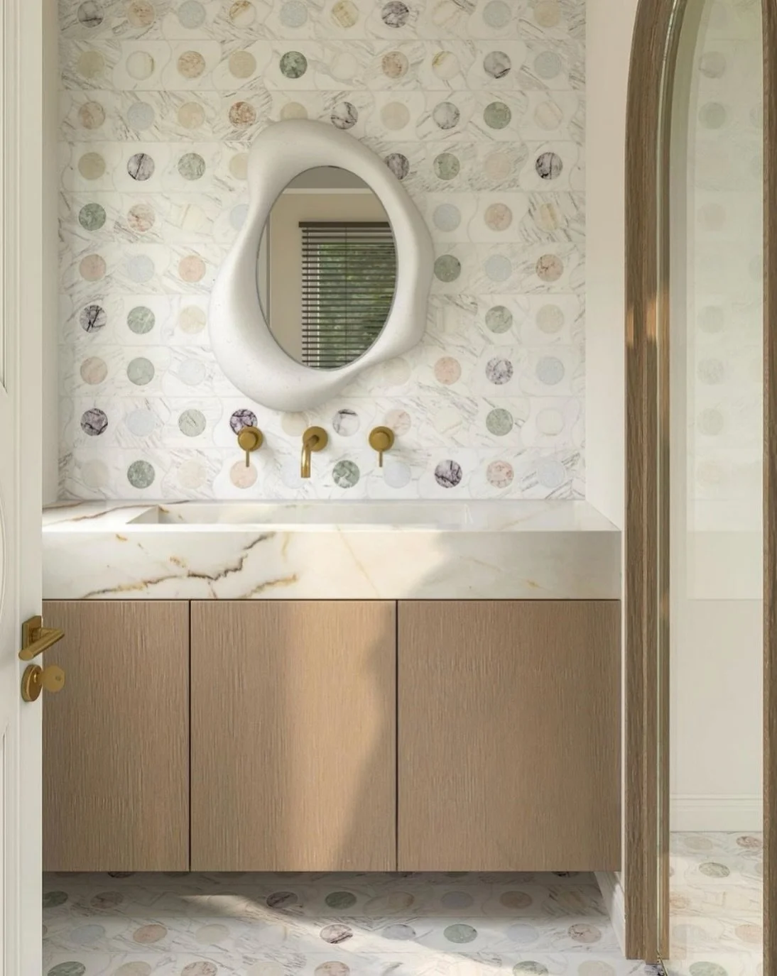 A study in repetition. Playful use of stones and curves, lifting the floor upward.