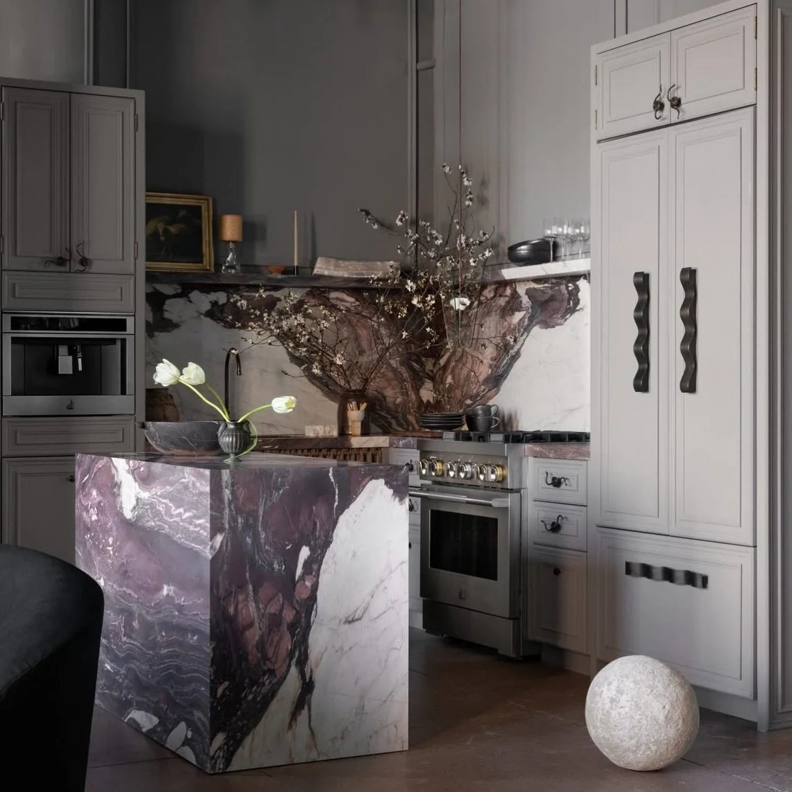 I&rsquo;m always drawn to spaces where material choice carries the narrative. In this instance, it's the bold stone and hardware.