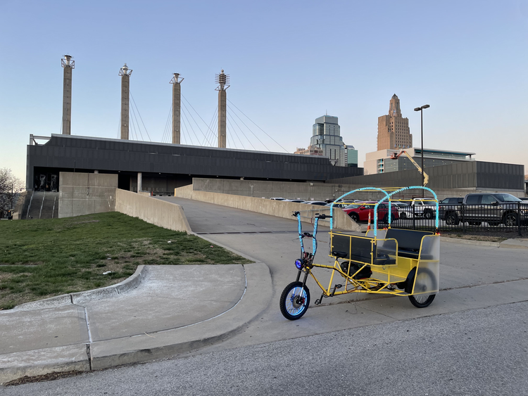 EZ Pedicabs fleet at night