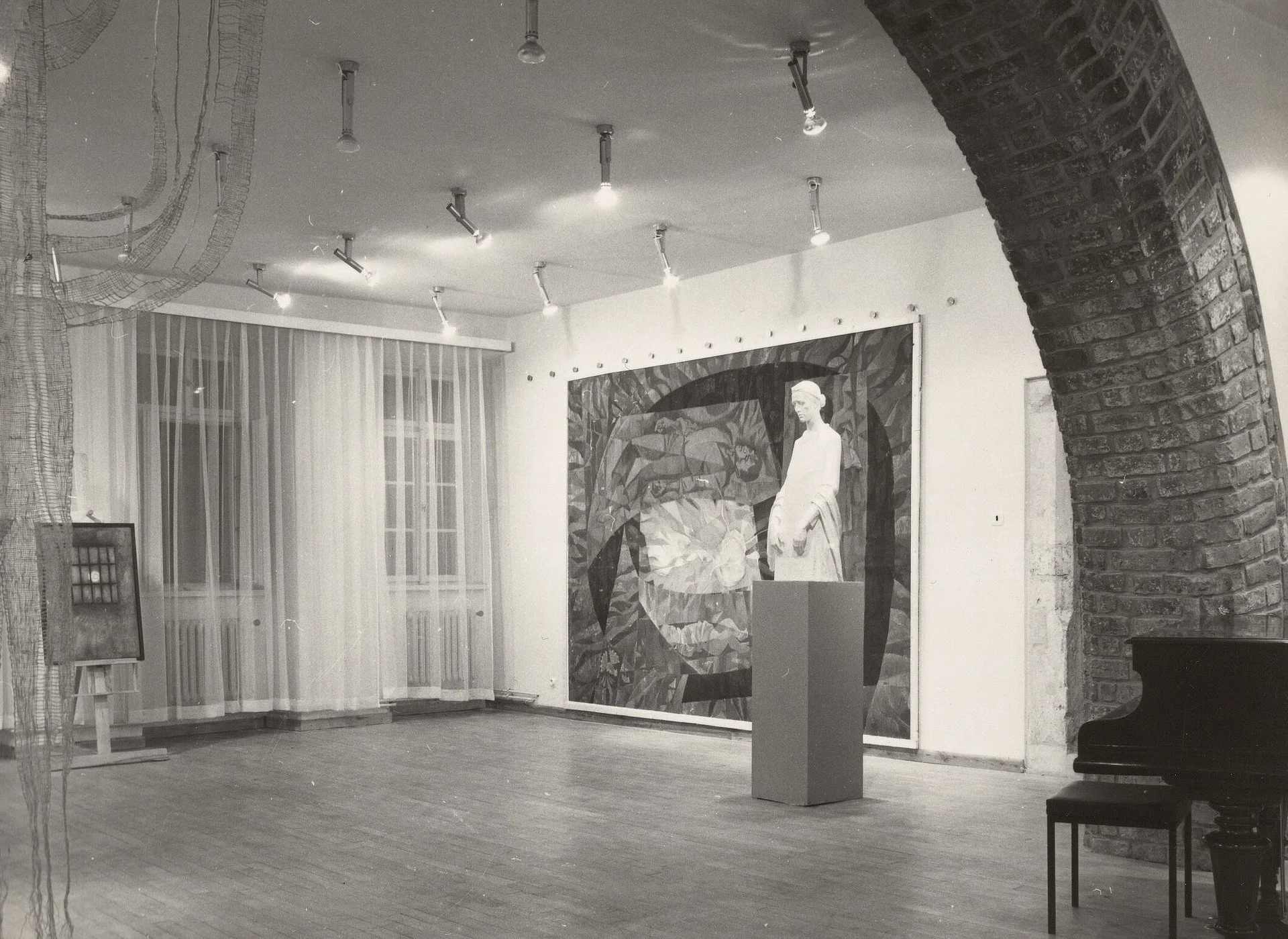 Normalization display in Nelahozeves. A couple of artworks selected for the 1972 show on display in a large room.