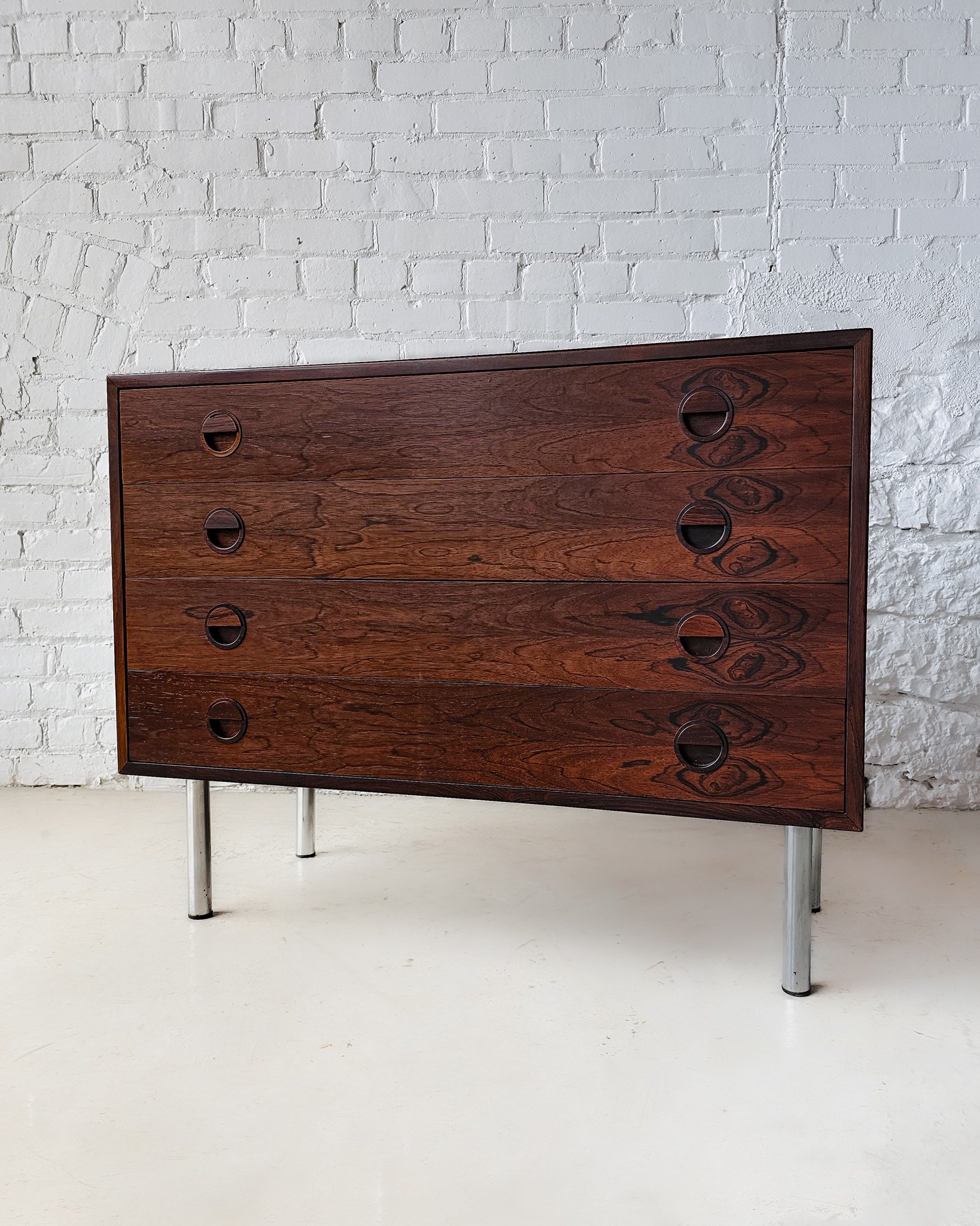 Also: Now’s a great time to shop—our spring sale is live with up to 30% off!
Sleek, sculptural, and seriously cool—this Danish rosewood and chrome cabinet by Rud Thygesen & Johnny Sørensen for Hansen & Guldborg bring