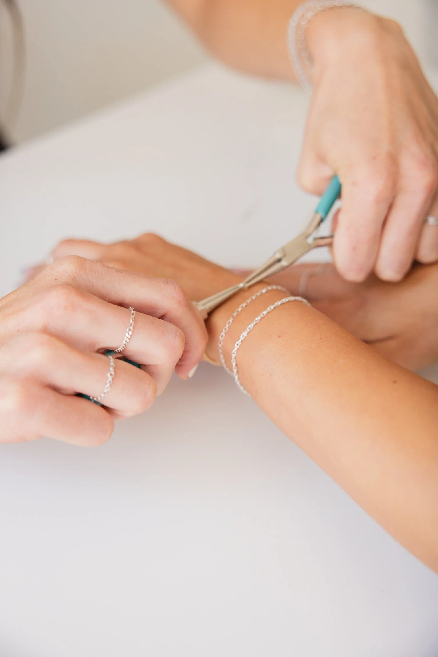 Finishing a permanent bracelet on the wrist