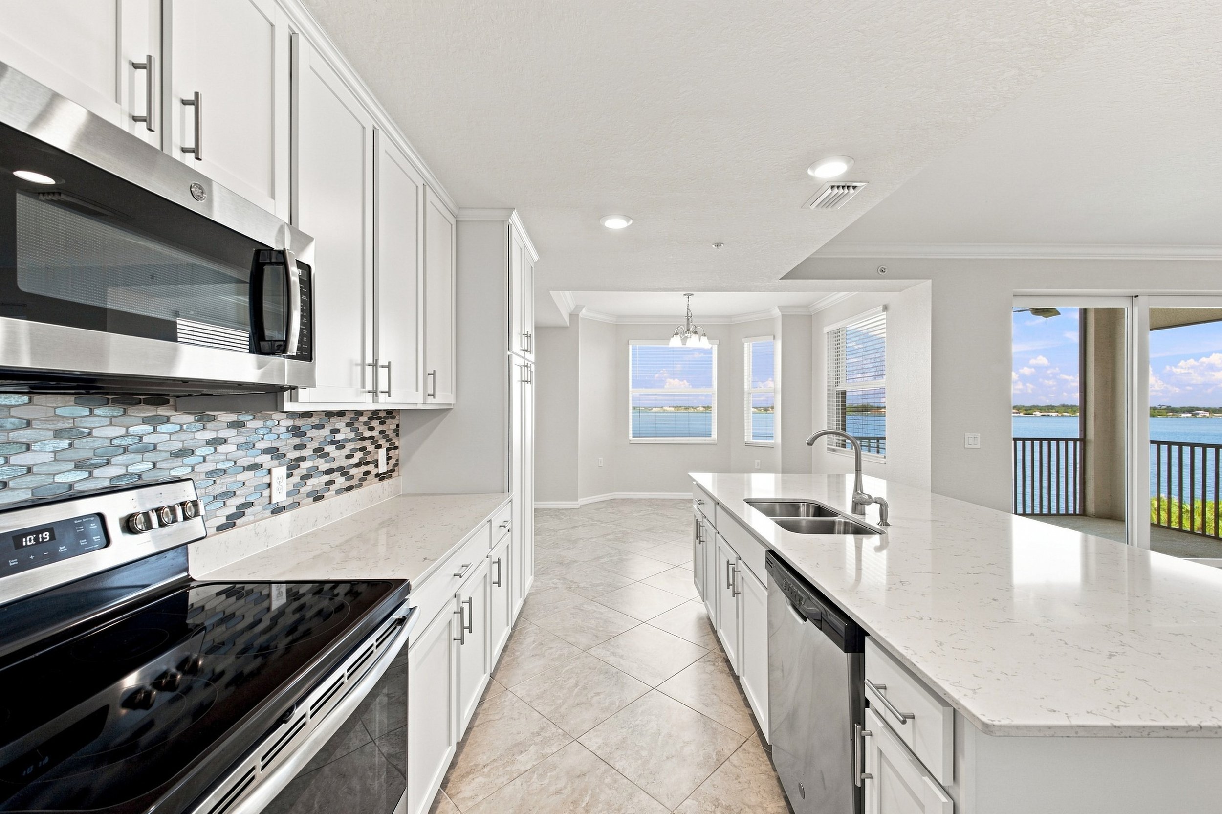 Professional real estate photography in Bradenton, FL showcasing a bright, modern kitchen.