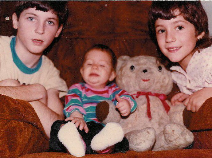 Photo of author and older siblings taken by Leonard Asselin