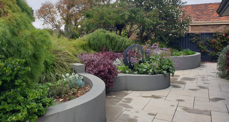 AFTER: Level 2 consult: contemporary perennial plantings. Wall design/install Country Earth