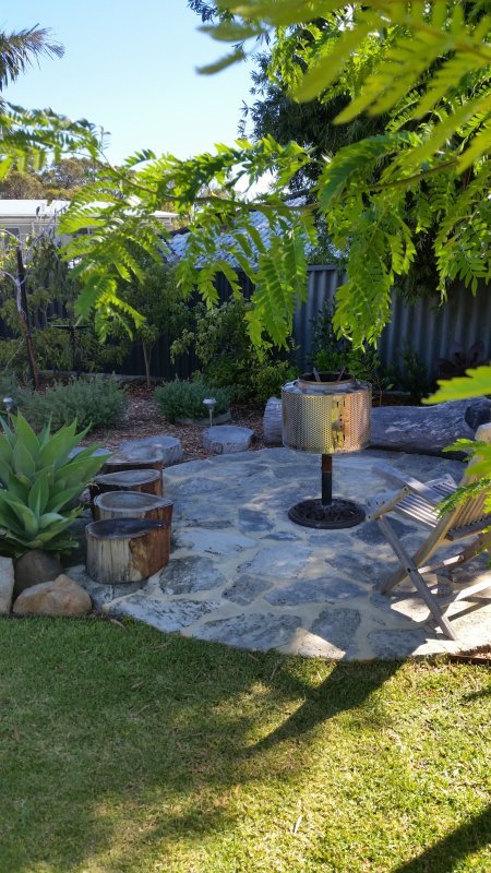 AFTER: Inexpensive firepit with crazy paving