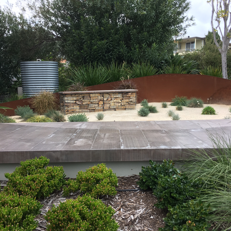 AFTER: Full planting design: Contemporary gravel garden with gabion seat East Fremantle (Hardscape design Blake Willis