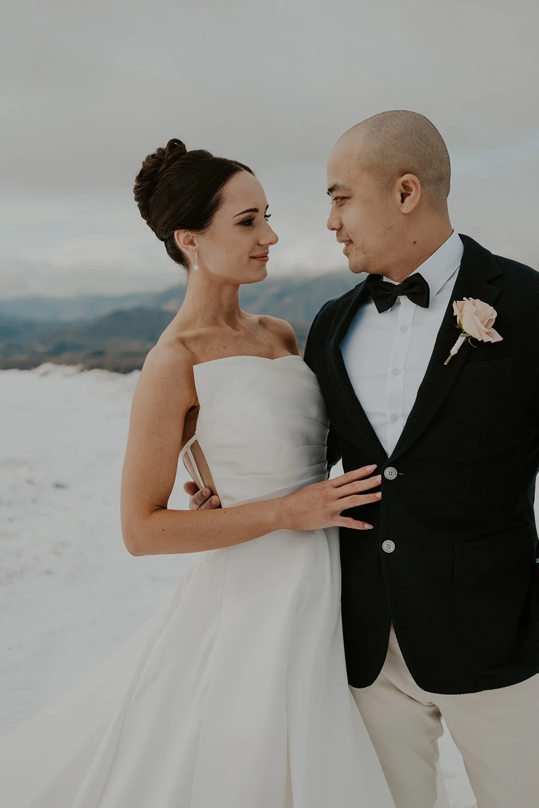 Bride and groom in the snow