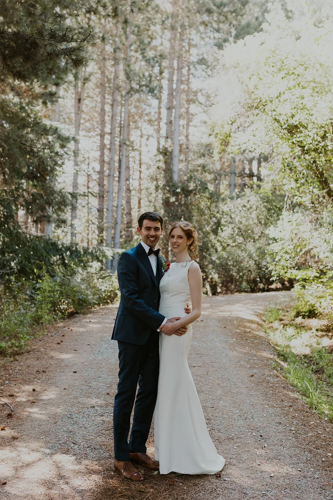 Bride and groom in the woods
