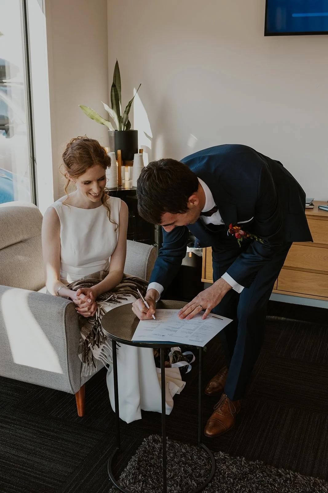 Signing the wedding papers