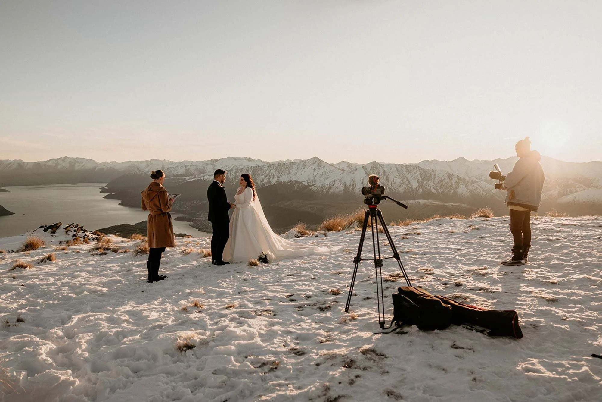 Behind the scenes photshoot of couple getting married in the snow
