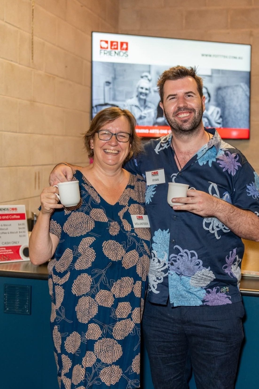 Volunteers, Sasha and Ryan, working at FOTT's Coffee Corner during the the Anthony Callea and Tim Campbell's performance "The Songs of Elton and George!"