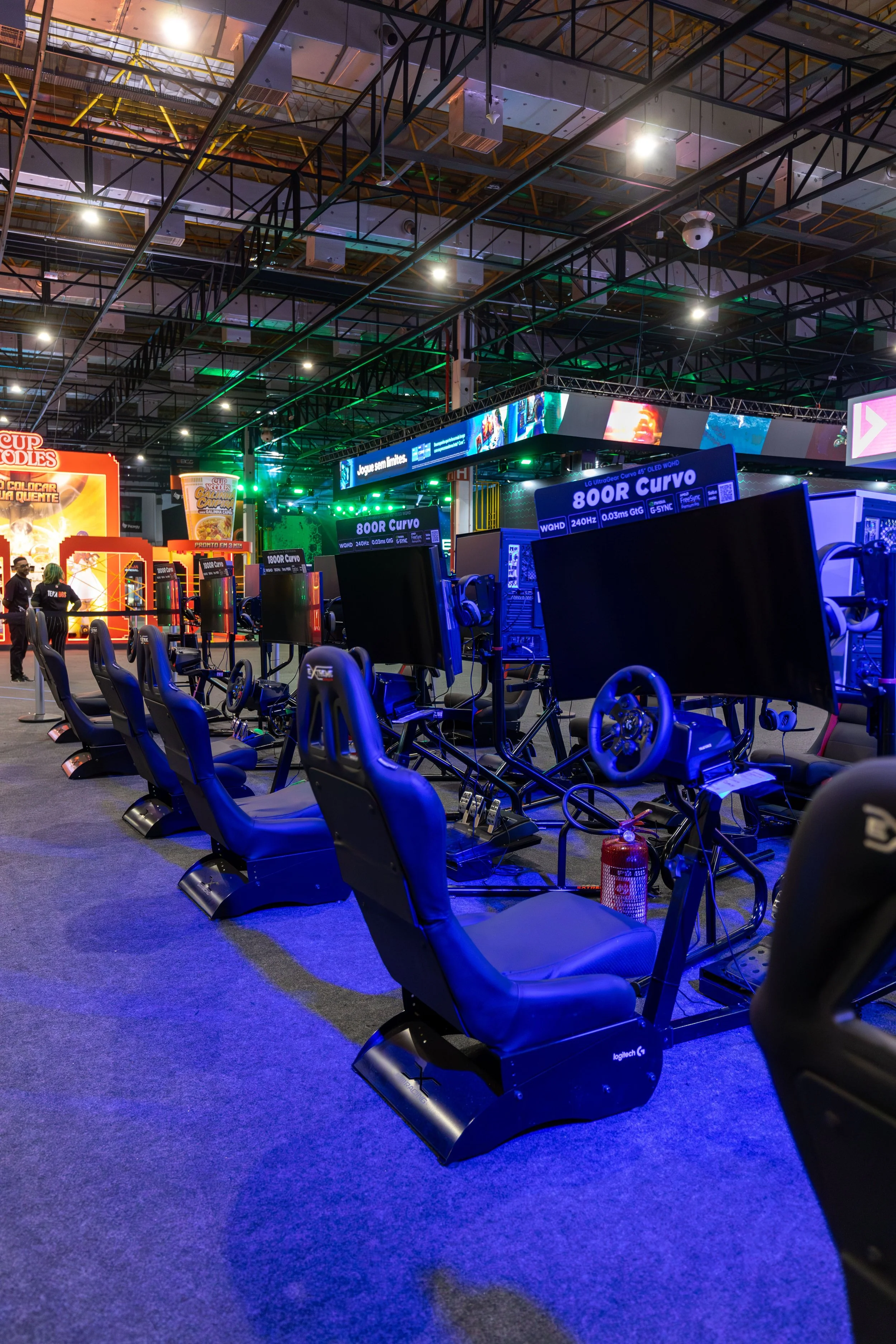 Row of racing simulators at a motorsport fan experience