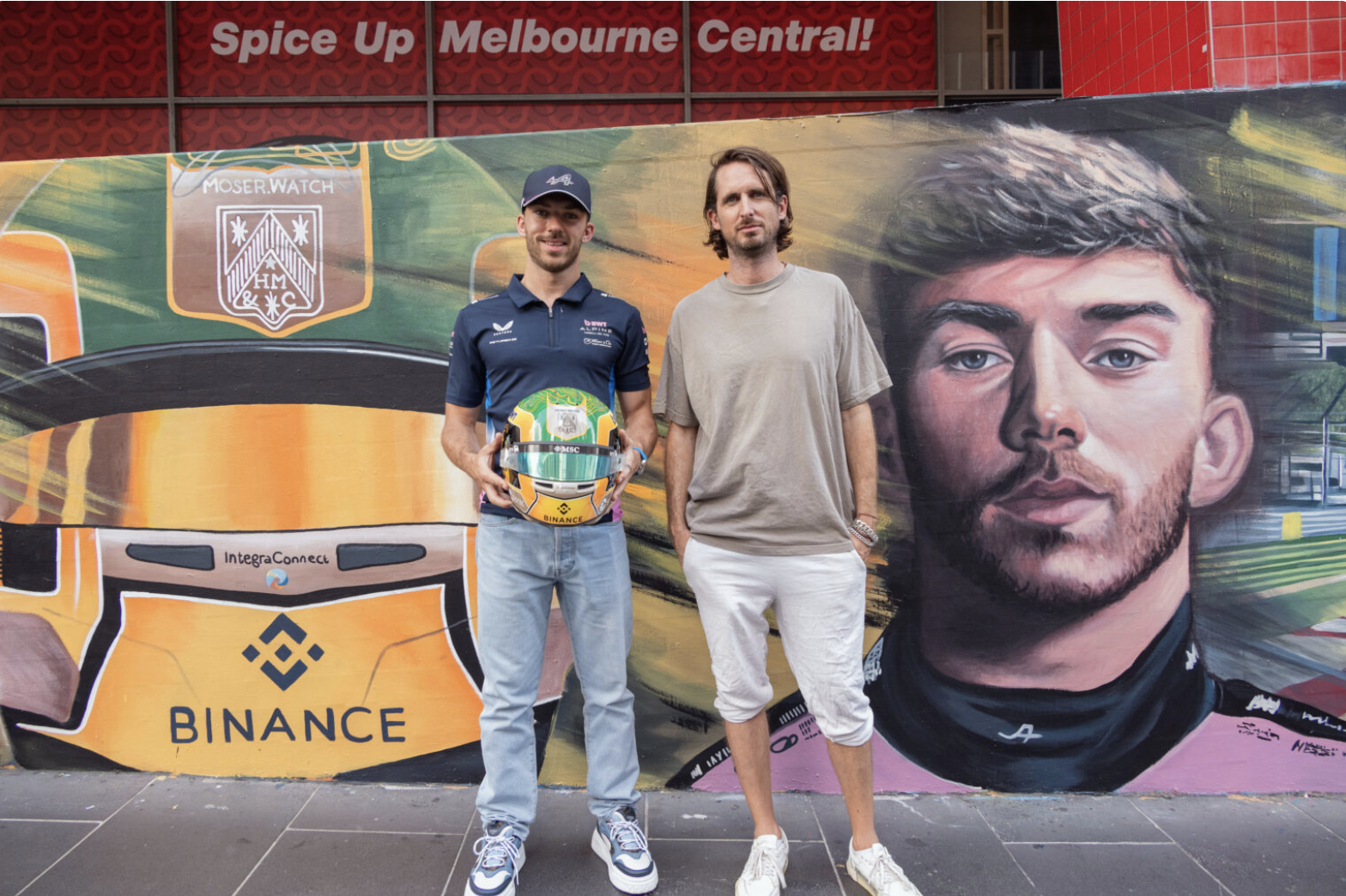 ierre Gasly and artist Matt Adnate in front of Binance Melbourne street art mural