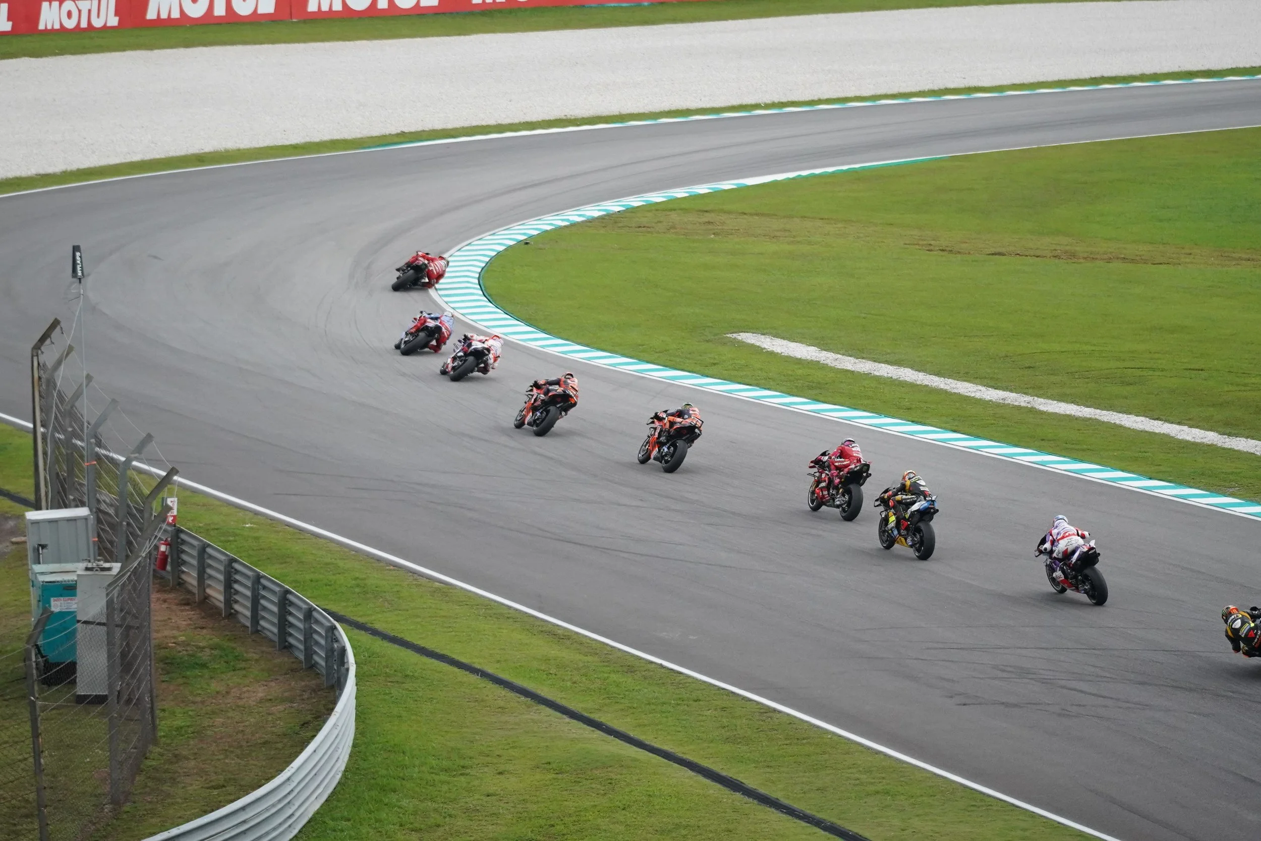 MotoGP riders racing on track during a Grand Prix weekend