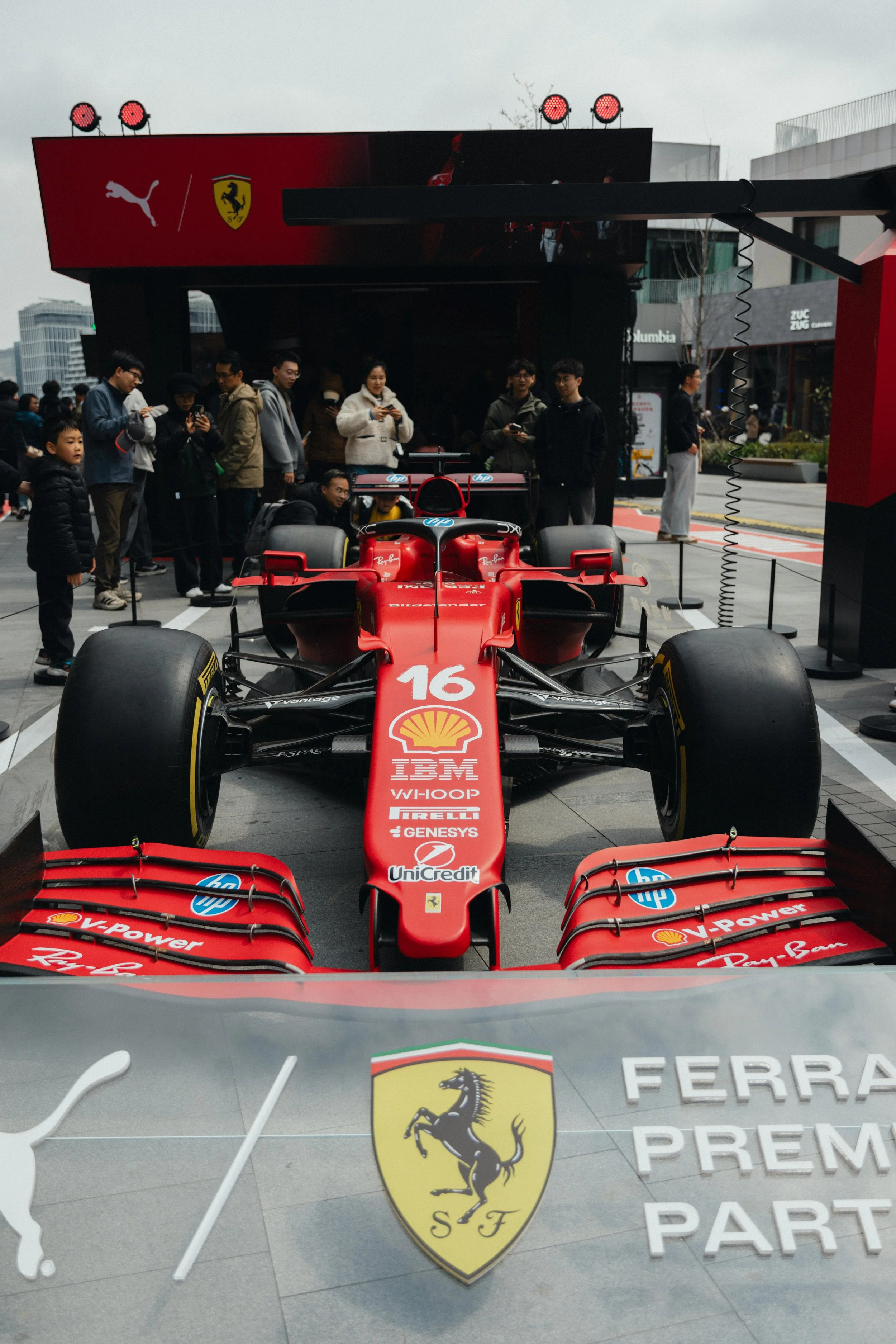 Ferrari Formula 1 car displayed at a public brand activation