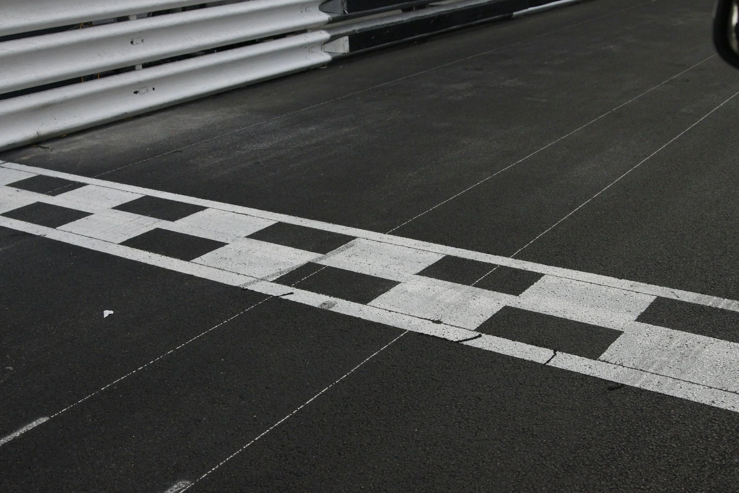 Start and finish line markings on a Formula 1 race circuit.