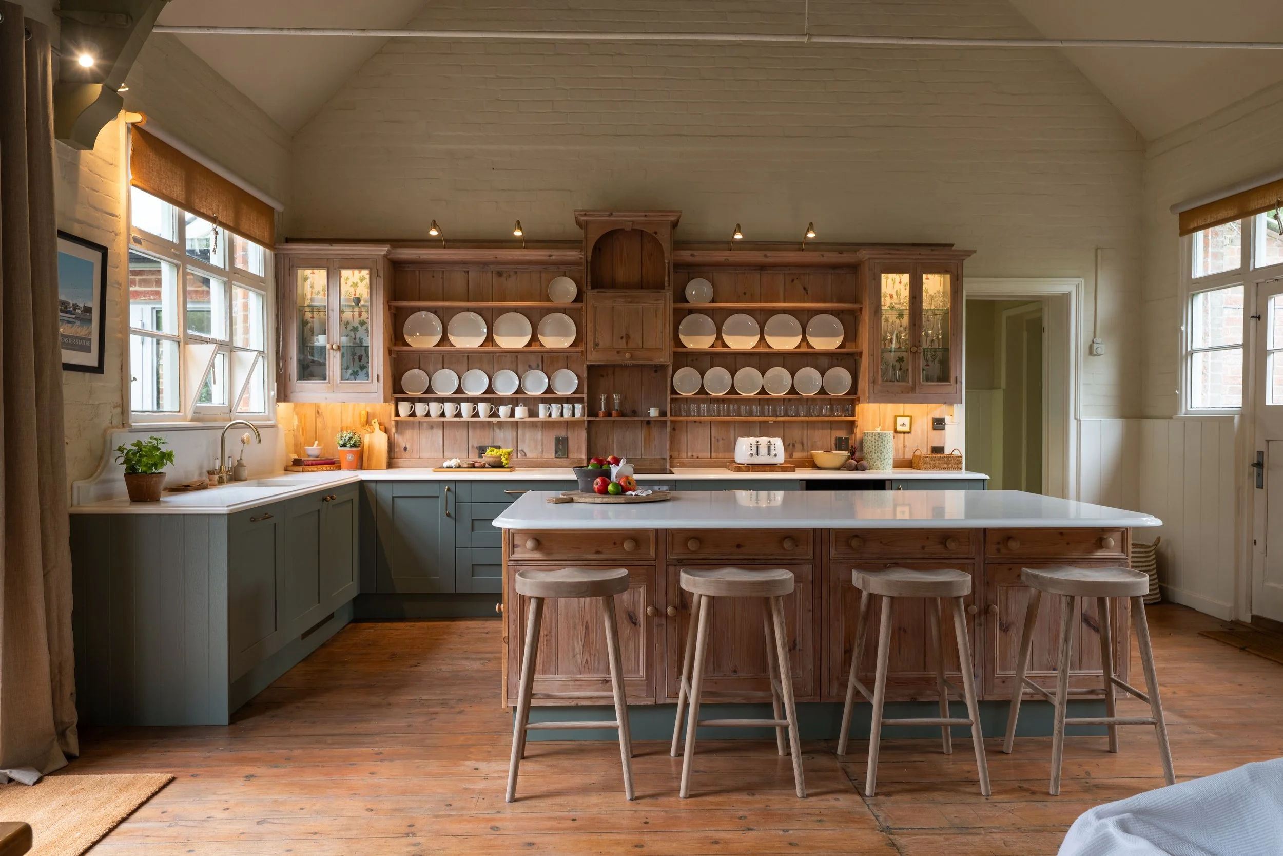 Reed Green Shaker kitchen with reclaimed timber island in the former Great Snoring village school, North Norfolk.