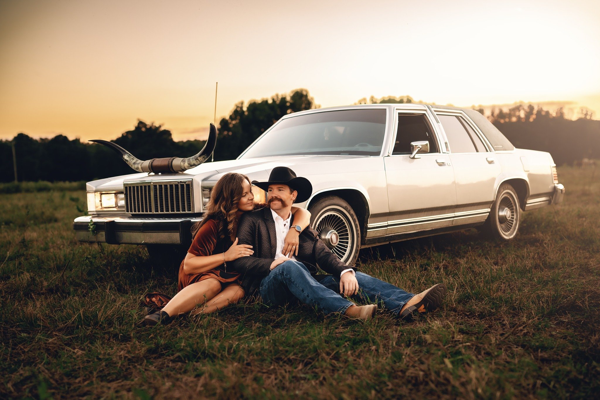 engagement photoshoot with cows arkansas.jpg
